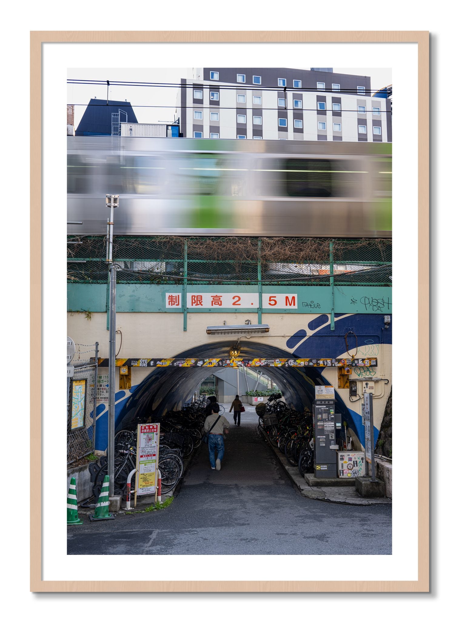 Framed photograph of Tokyo Bustle by Dylan Ozanich, Maple frame, Borders