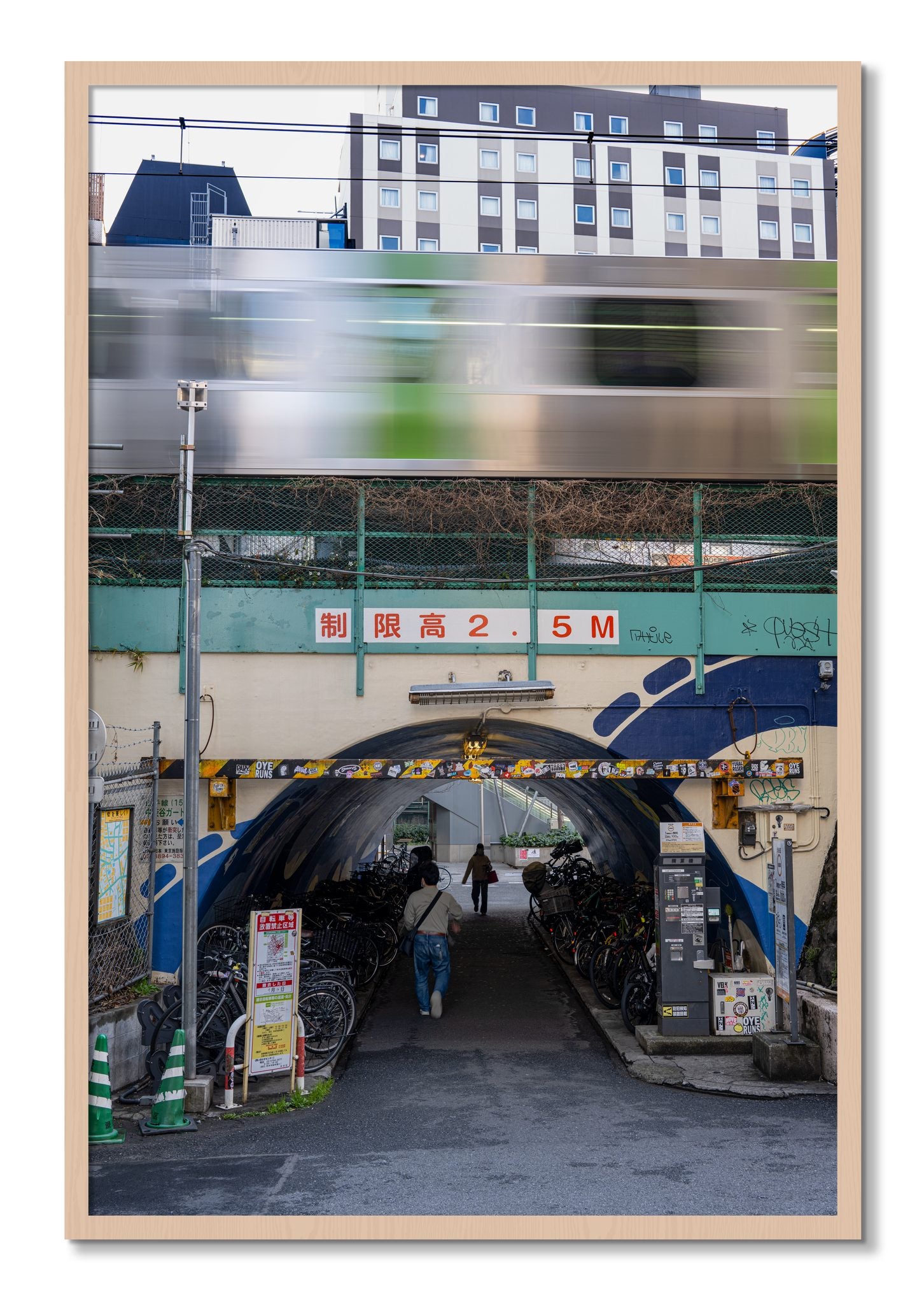 Framed photograph of Tokyo Bustle by Dylan Ozanich, Maple frame, Full Bleed