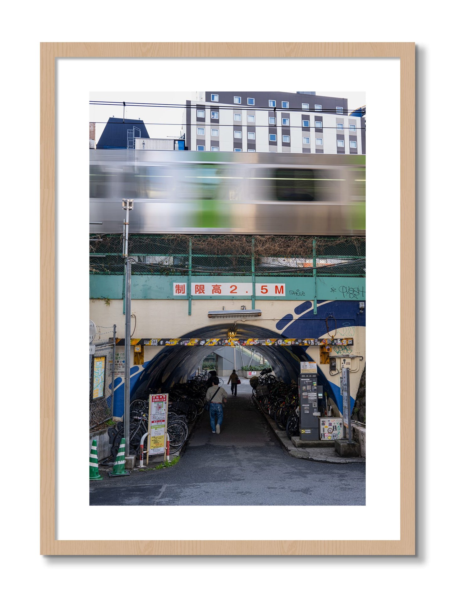 Framed photograph of Tokyo Bustle by Dylan Ozanich, Oak frame, Borders