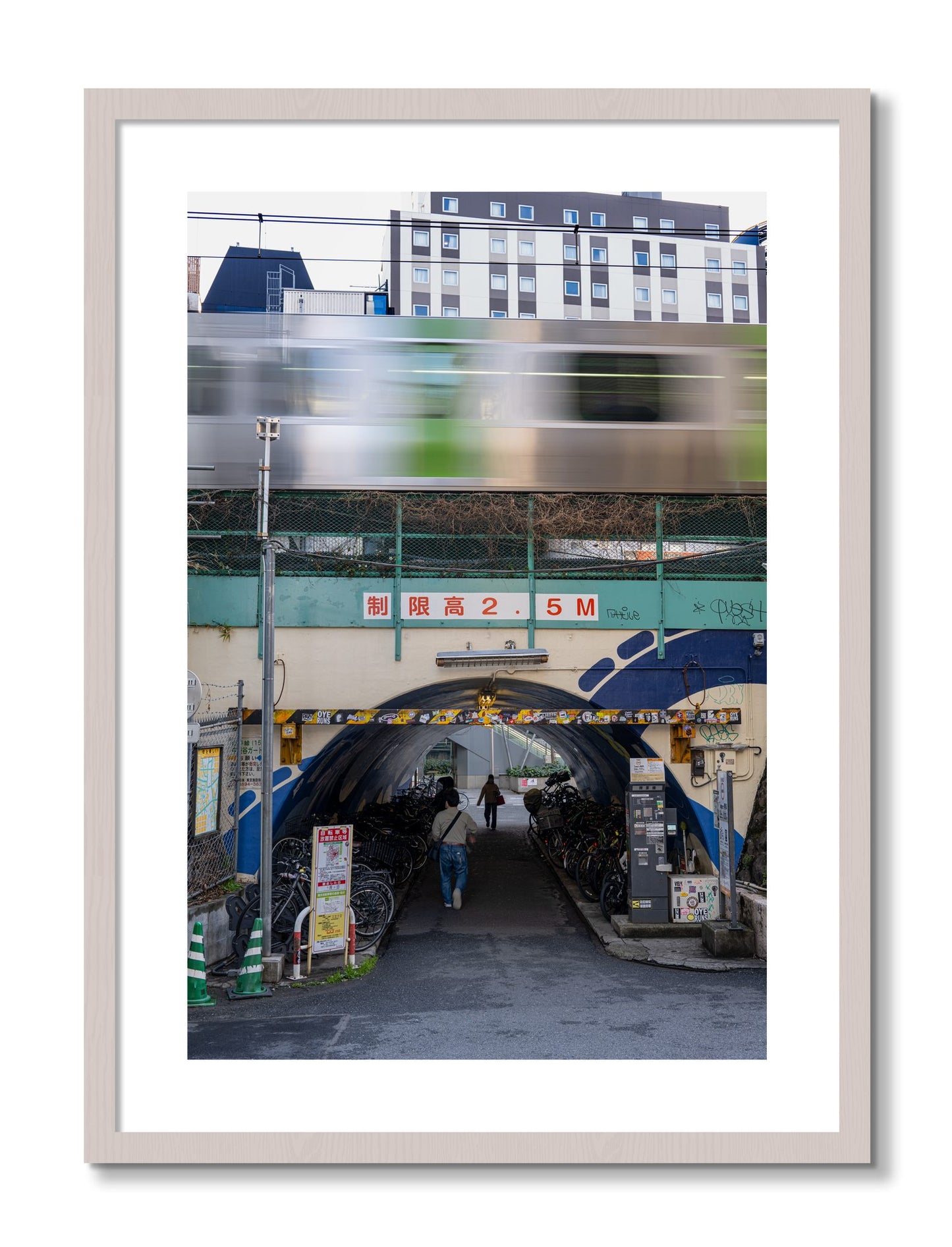 Framed photograph of Tokyo Bustle by Dylan Ozanich, White Maple frame, Borders