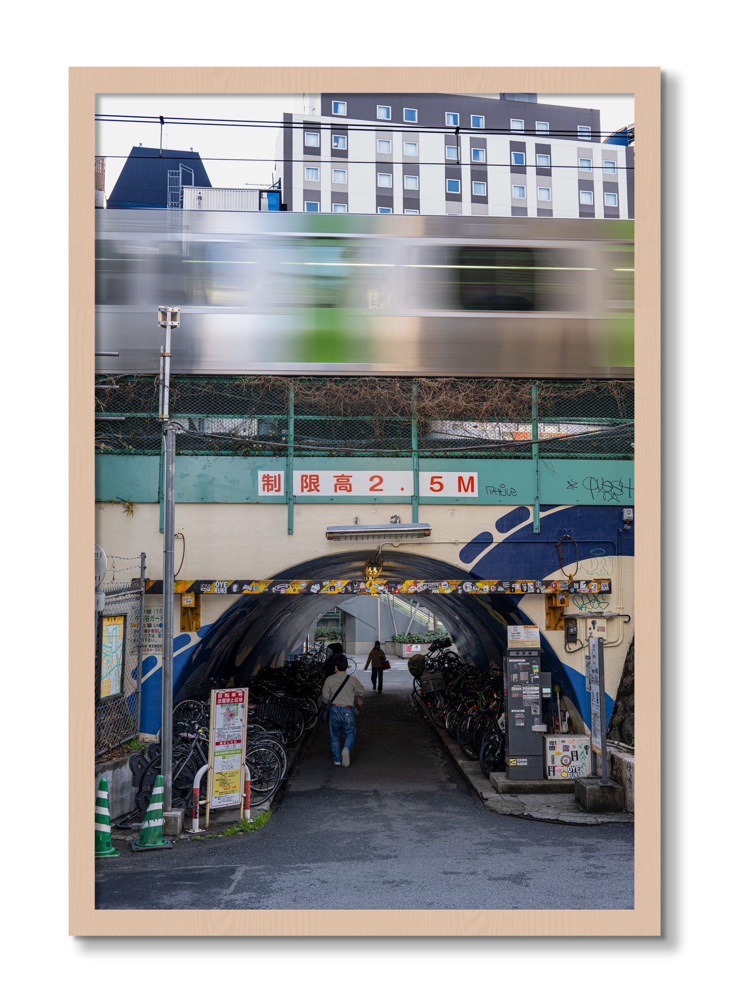 Framed photograph of Tokyo Bustle by Dylan Ozanich, Maple frame, Full Bleed