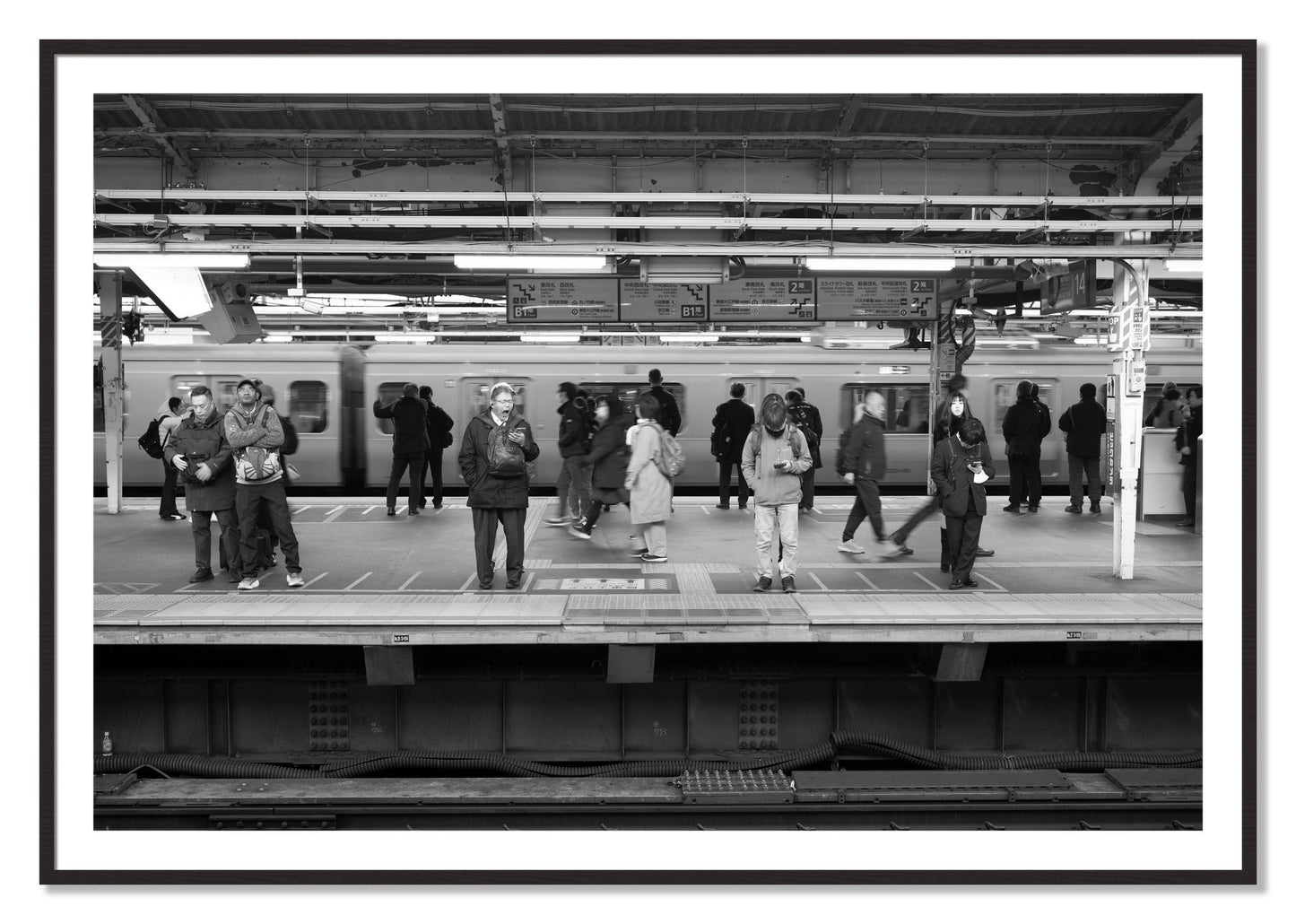 Framed photograph of Tokyo Subway by Dylan Ozanich, Black Walnut frame, Borders