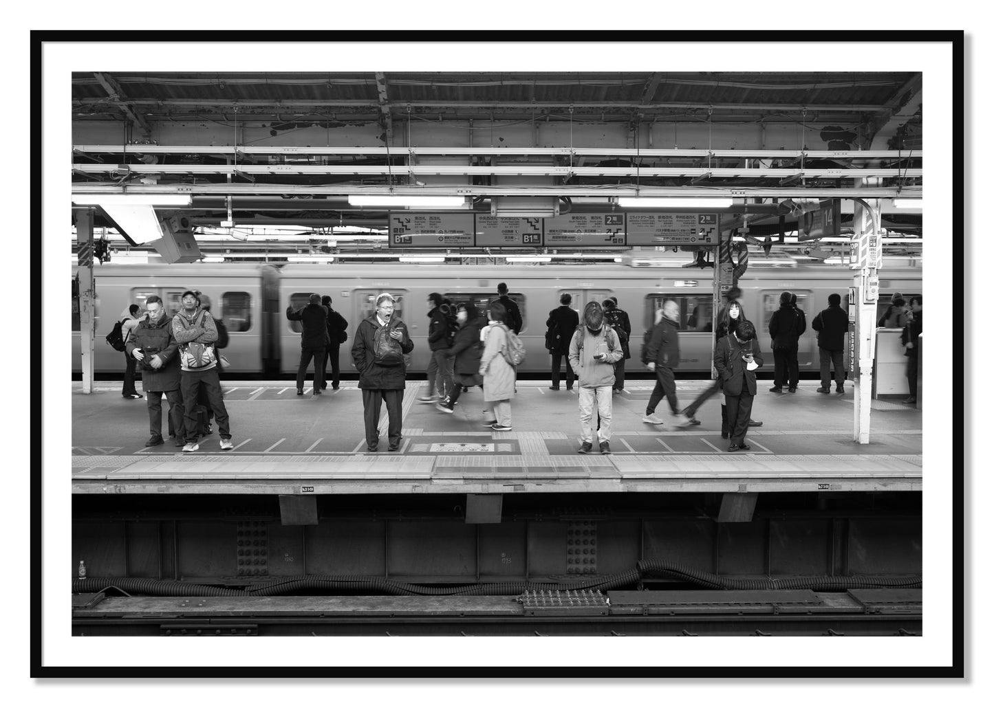 Framed photograph of Tokyo Subway by Dylan Ozanich, Black frame, Borders