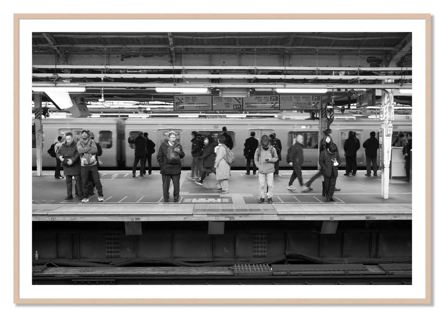 Framed photograph of Tokyo Subway by Dylan Ozanich, Maple frame, Borders