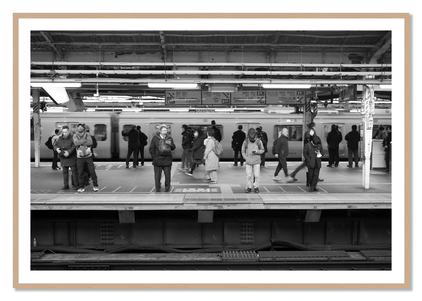 Framed photograph of Tokyo Subway by Dylan Ozanich, Oak frame, Borders