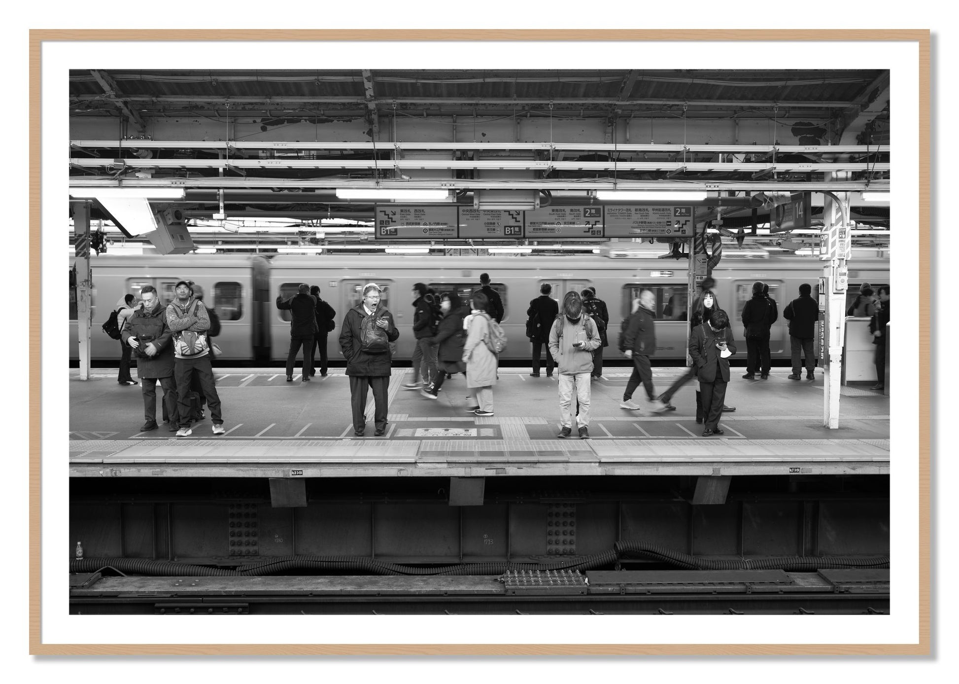Framed photograph of Tokyo Subway by Dylan Ozanich, Oak frame, Borders