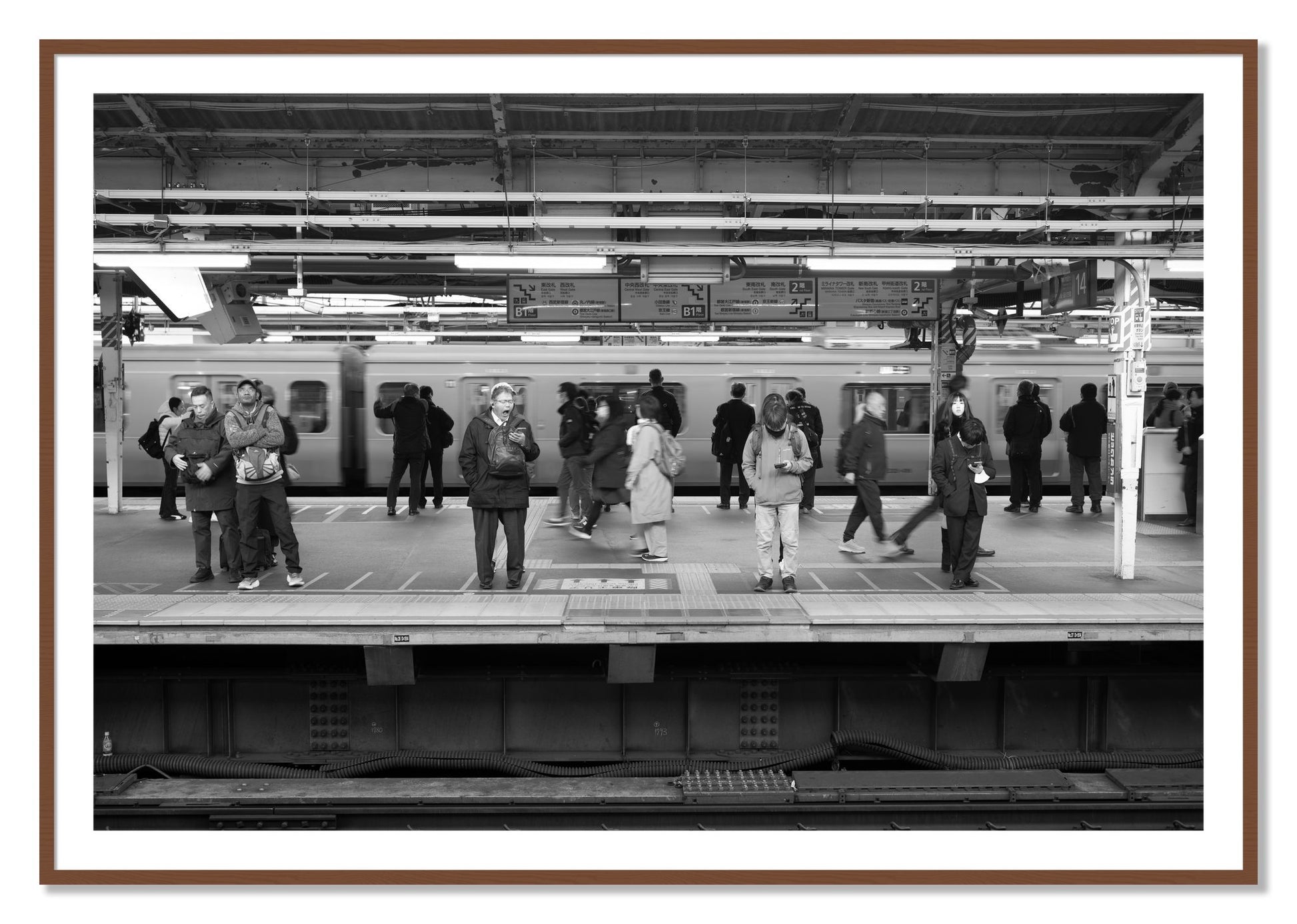 Framed photograph of Tokyo Subway by Dylan Ozanich, Walnut frame, Borders
