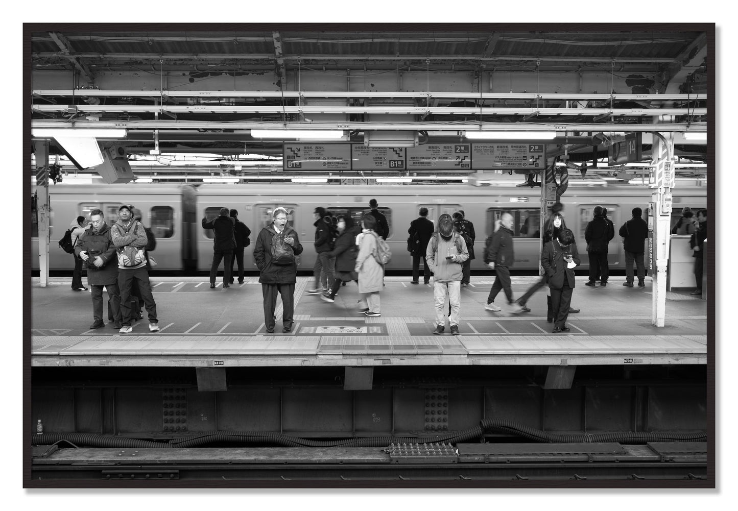 Framed photograph of Tokyo Subway by Dylan Ozanich, Black Walnut frame, Full Bleed