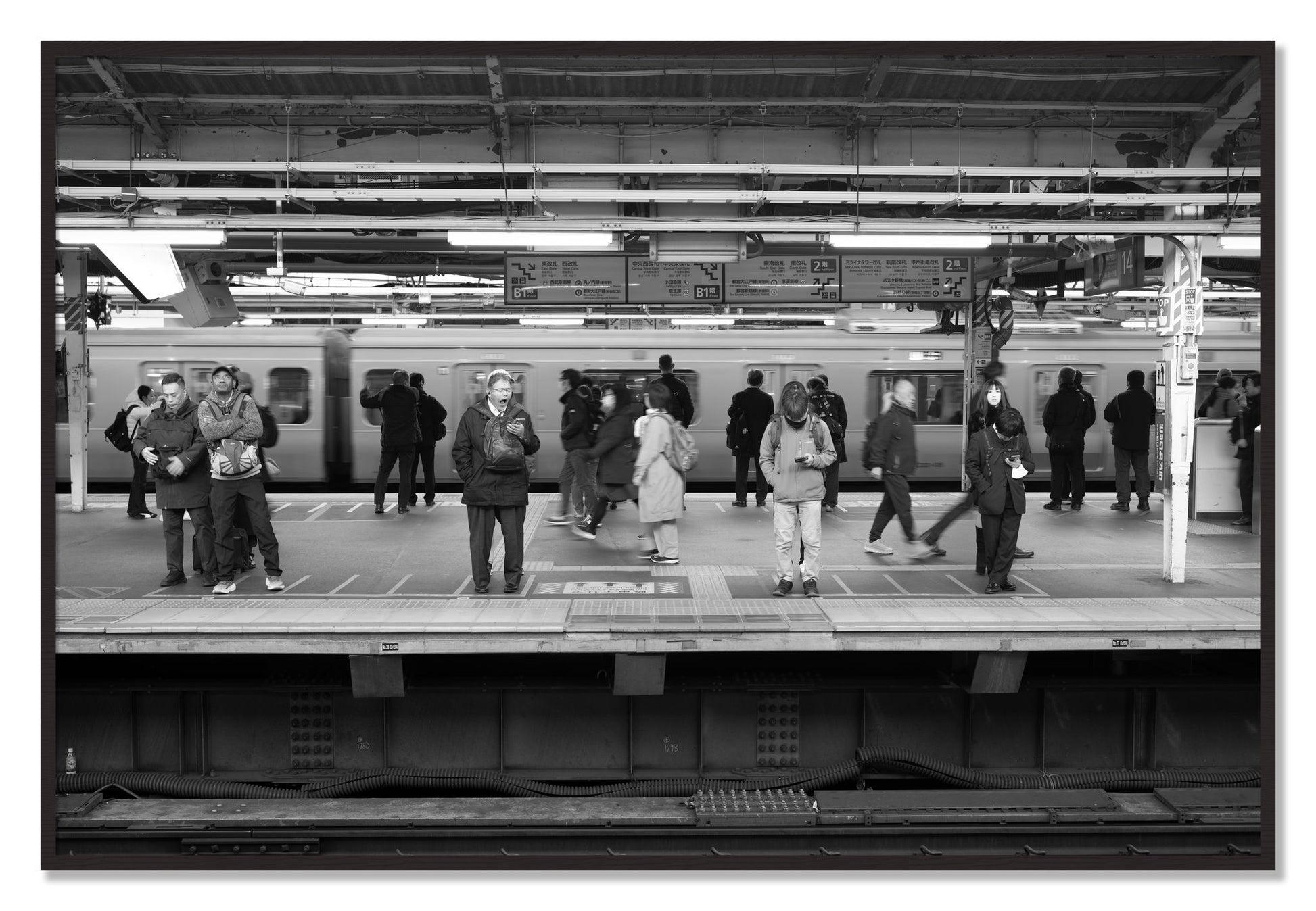 Framed photograph of Tokyo Subway by Dylan Ozanich, Black Walnut frame, Full Bleed