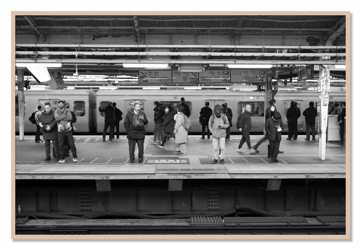Framed photograph of Tokyo Subway by Dylan Ozanich, Maple frame, Full Bleed