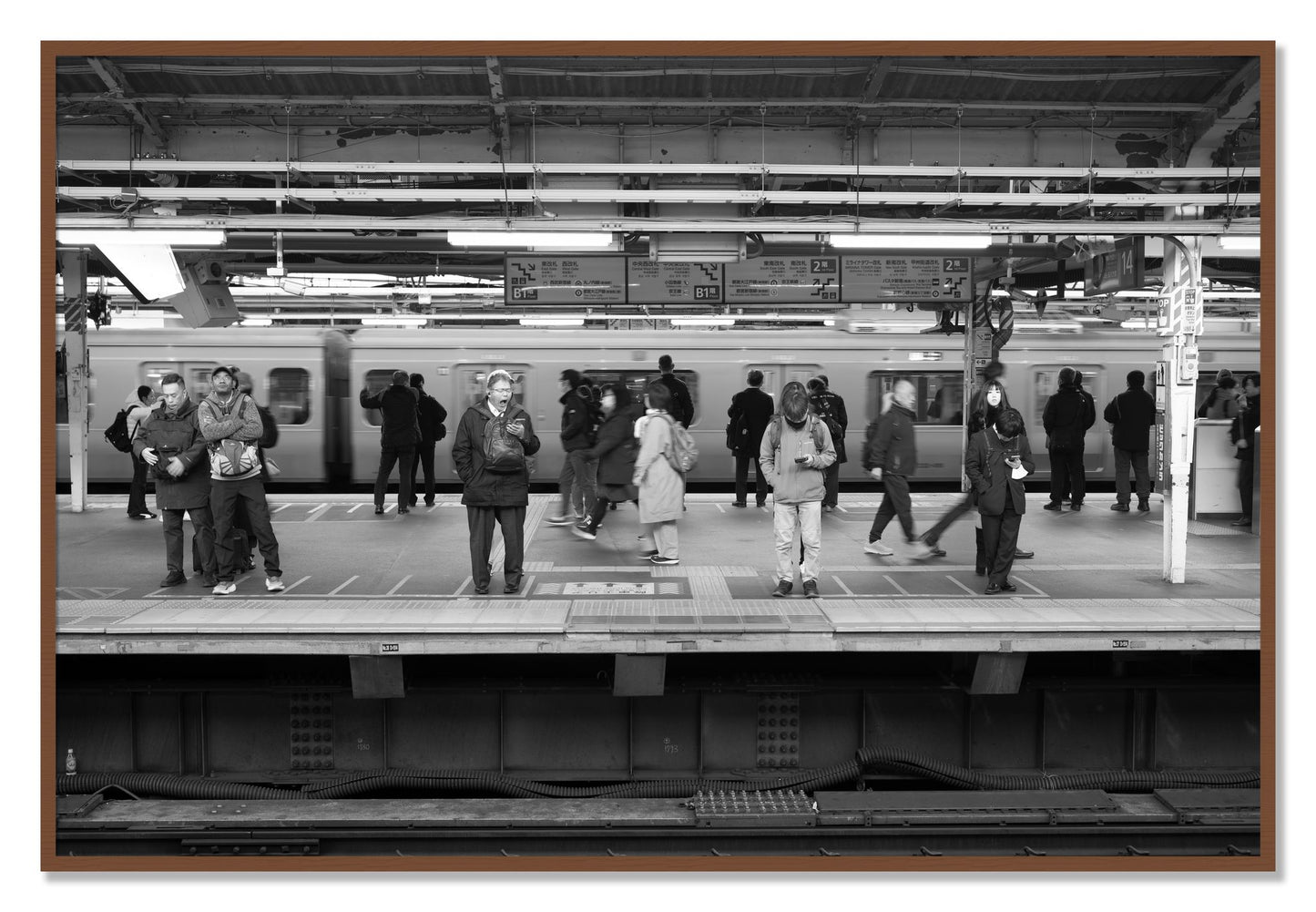 Framed photograph of Tokyo Subway by Dylan Ozanich, Walnut frame, Full Bleed