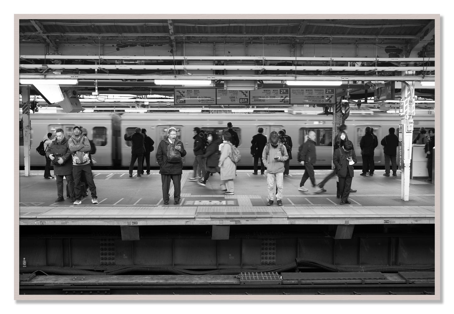 Framed photograph of Tokyo Subway by Dylan Ozanich, White Maple frame, Full Bleed