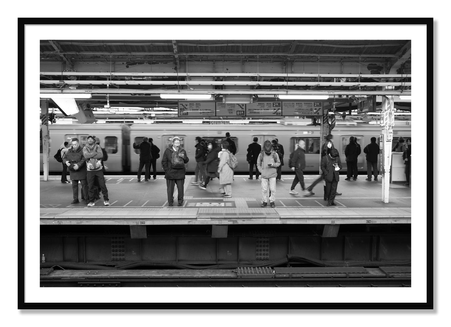 Framed photograph of Tokyo Subway by Dylan Ozanich, Black frame, Borders