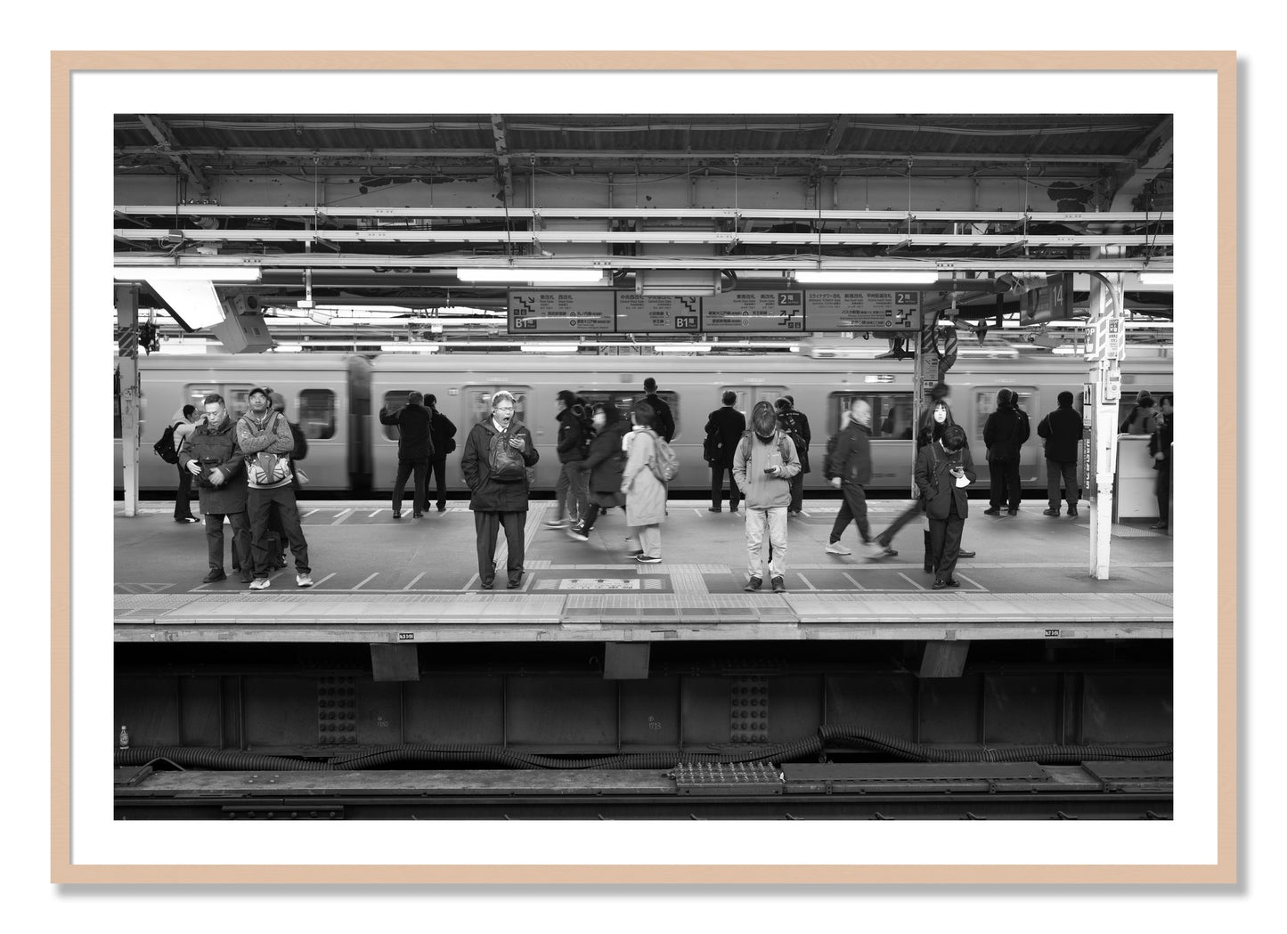 Framed photograph of Tokyo Subway by Dylan Ozanich, Maple frame, Borders