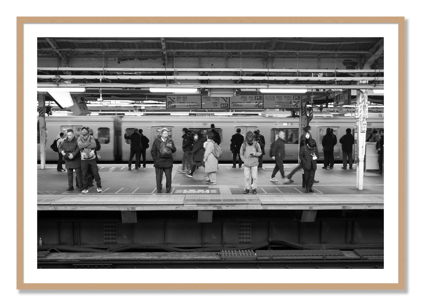 Framed photograph of Tokyo Subway by Dylan Ozanich, Oak frame, Borders
