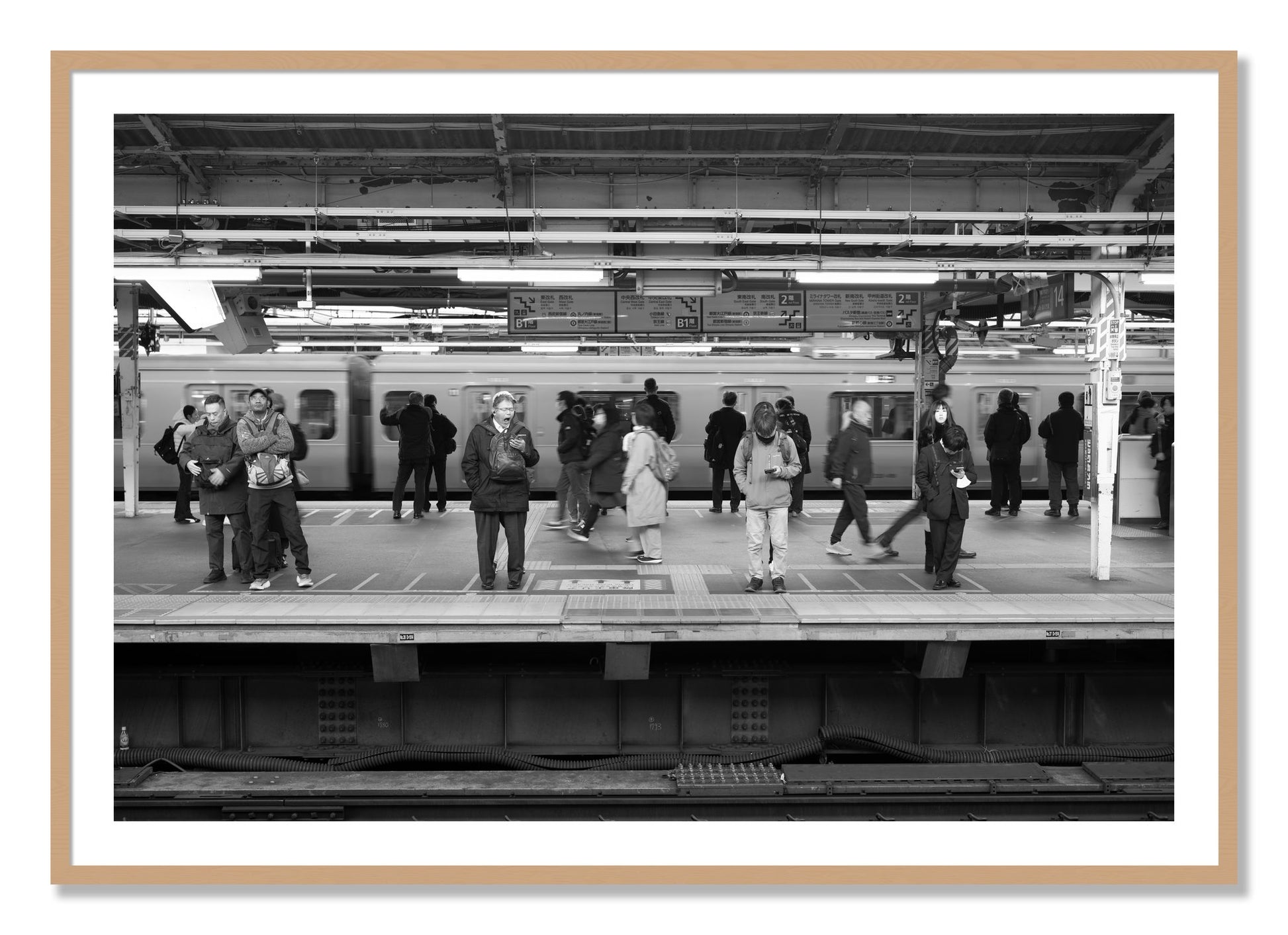 Framed photograph of Tokyo Subway by Dylan Ozanich, Oak frame, Borders