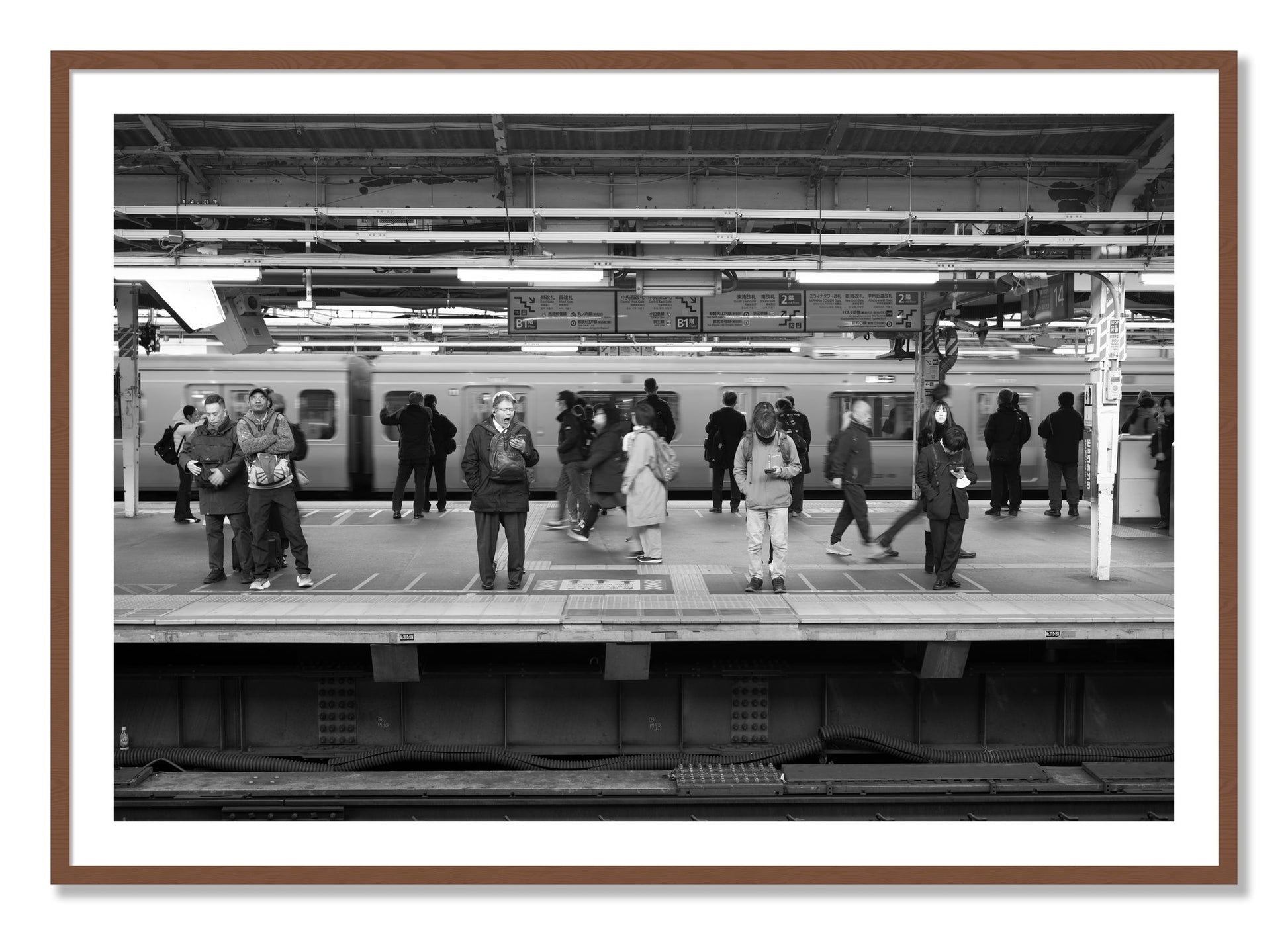 Framed photograph of Tokyo Subway by Dylan Ozanich, Walnut frame, Borders