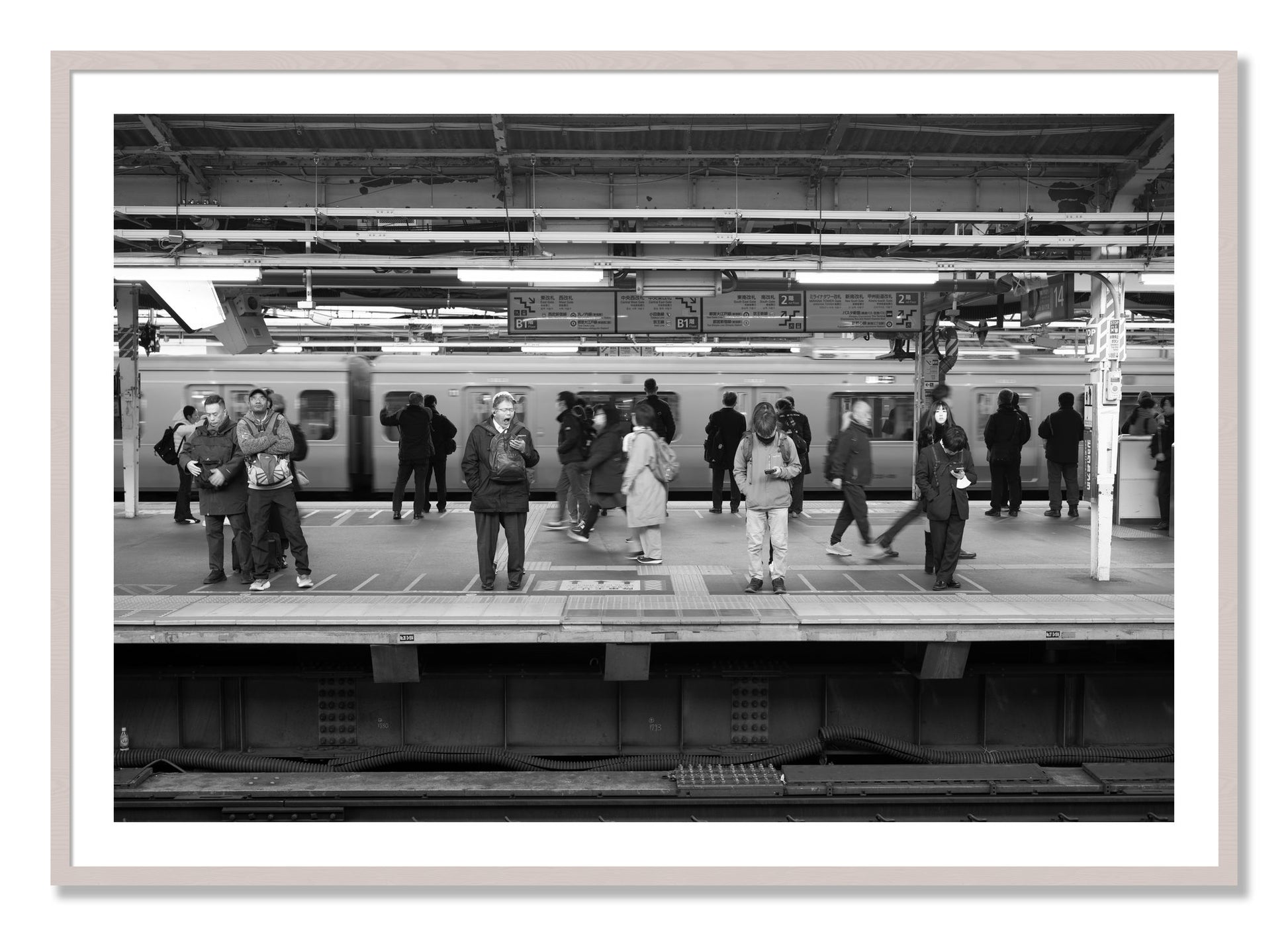 Framed photograph of Tokyo Subway by Dylan Ozanich, White Maple frame, Borders