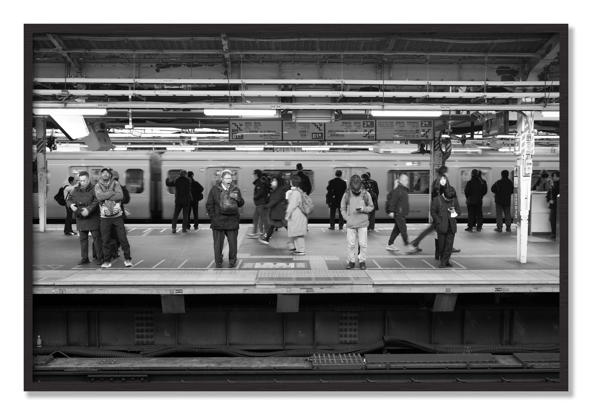 Framed photograph of Tokyo Subway by Dylan Ozanich, Black Walnut frame, Full Bleed