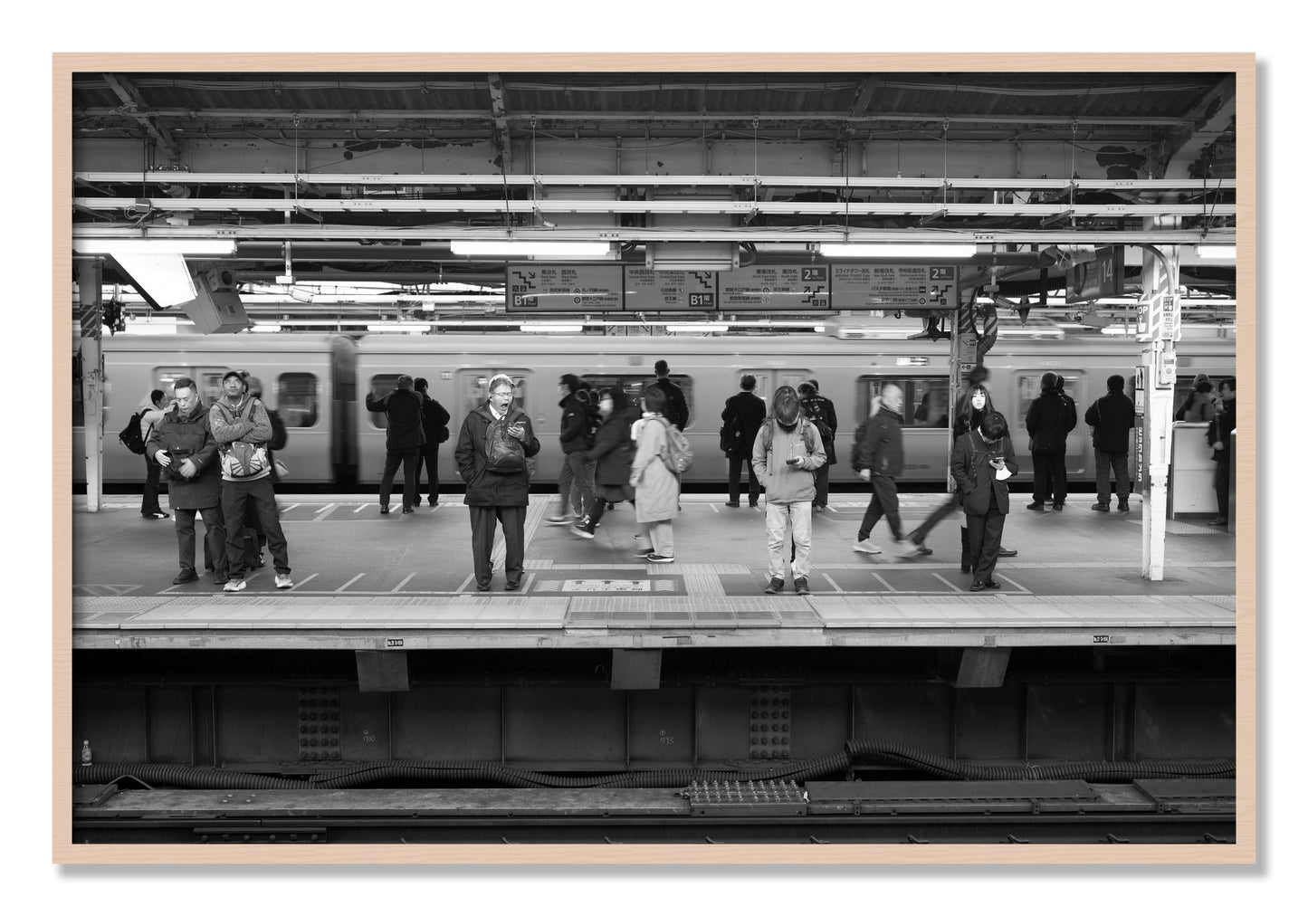 Framed photograph of Tokyo Subway by Dylan Ozanich, Maple frame, Full Bleed