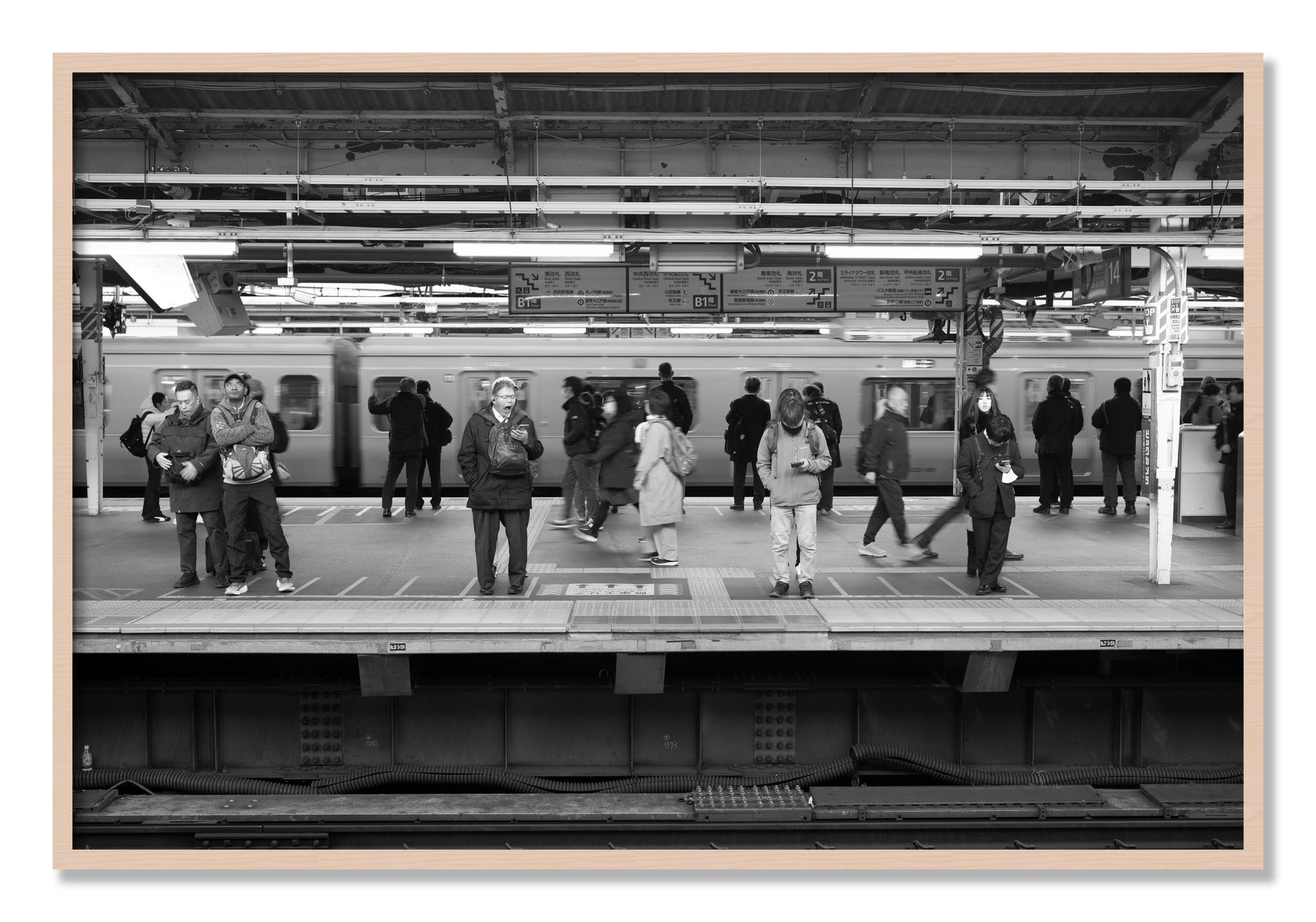 Framed photograph of Tokyo Subway by Dylan Ozanich, Maple frame, Full Bleed