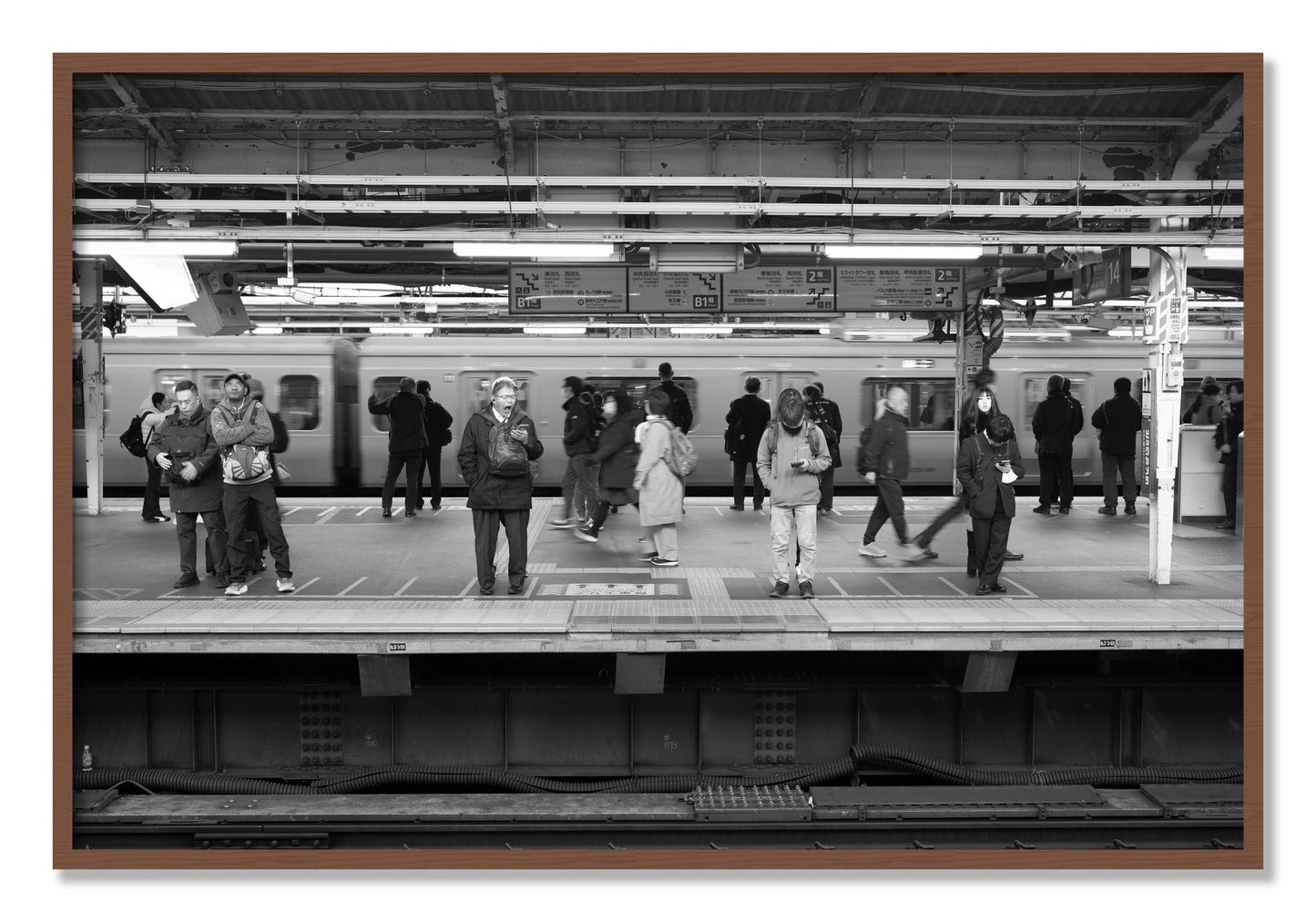 Framed photograph of Tokyo Subway by Dylan Ozanich, Walnut frame, Full Bleed