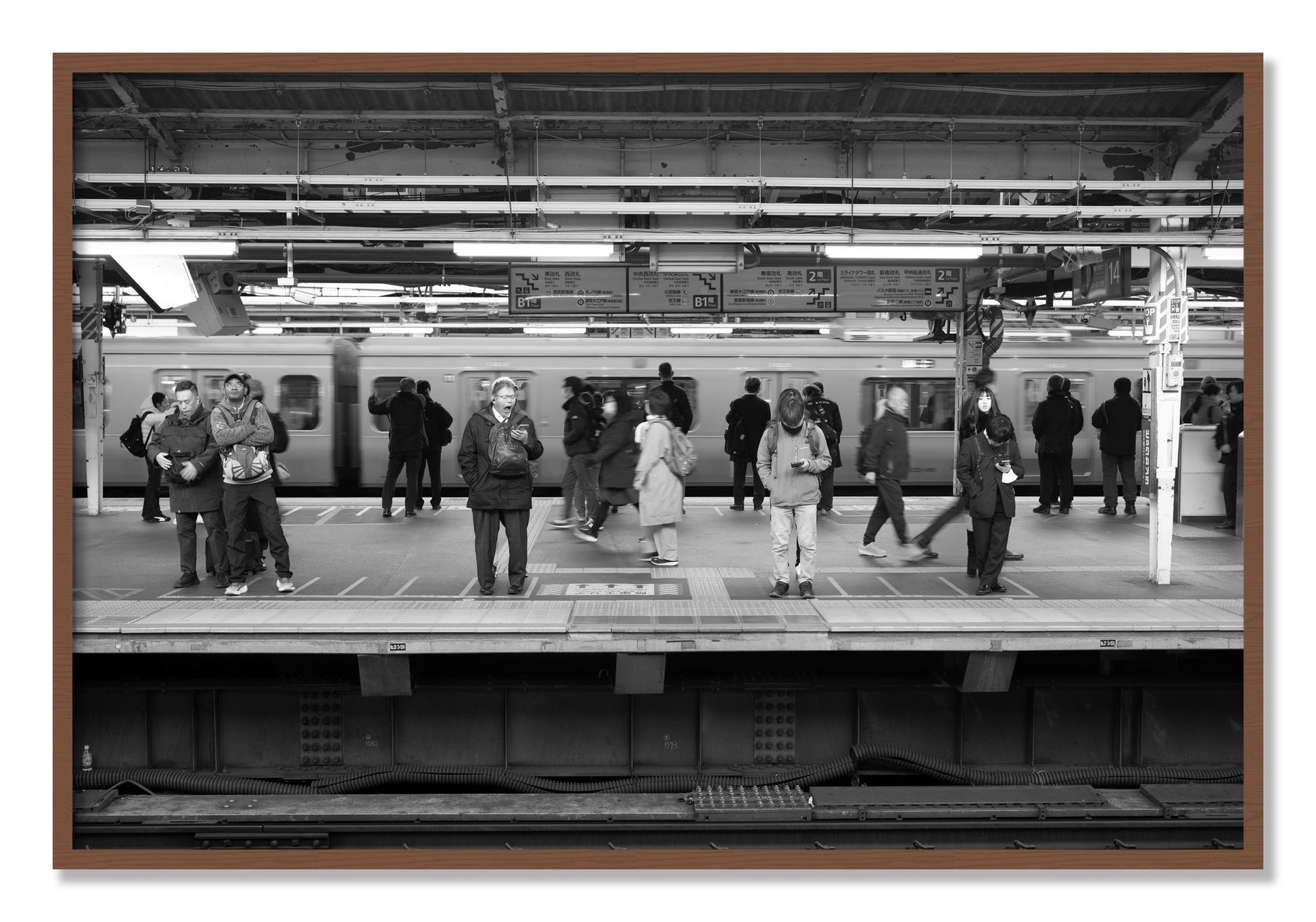 Framed photograph of Tokyo Subway by Dylan Ozanich, Walnut frame, Full Bleed