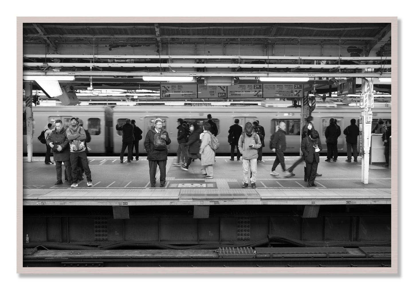 Framed photograph of Tokyo Subway by Dylan Ozanich, White Maple frame, Full Bleed