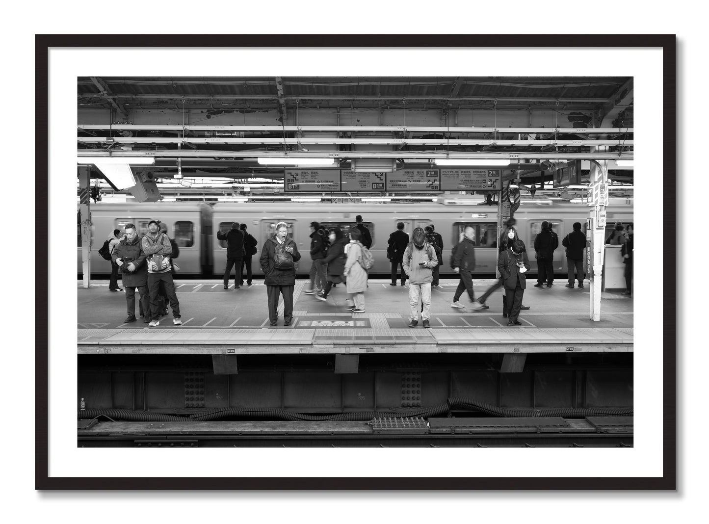 Framed photograph of Tokyo Subway by Dylan Ozanich, Black Walnut frame, Borders