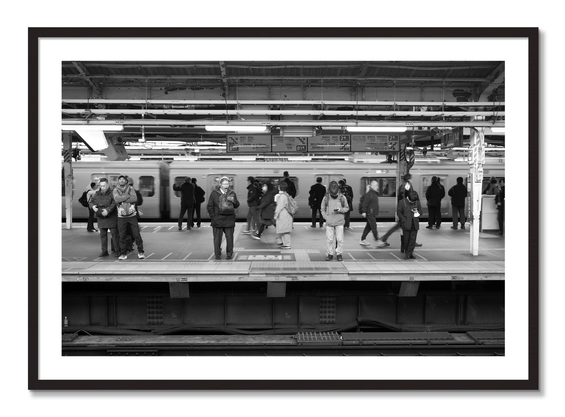 Framed photograph of Tokyo Subway by Dylan Ozanich, Black Walnut frame, Borders