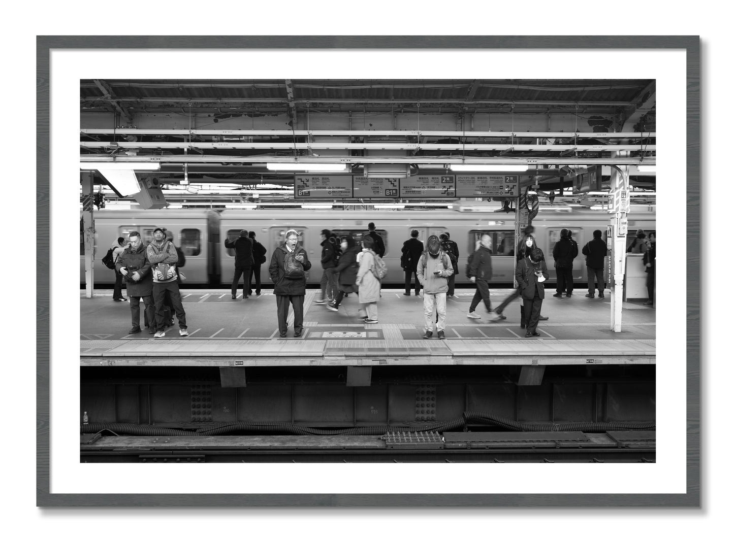 Framed photograph of Tokyo Subway by Dylan Ozanich, Grey frame, Borders