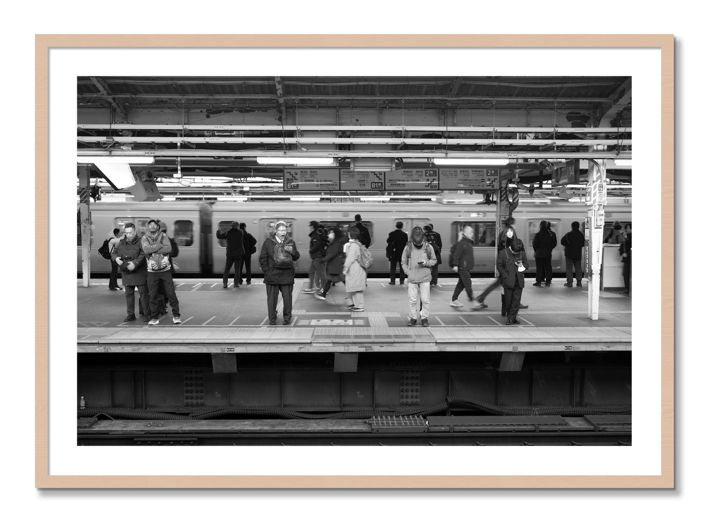 Framed photograph of Tokyo Subway by Dylan Ozanich, Maple frame, Borders