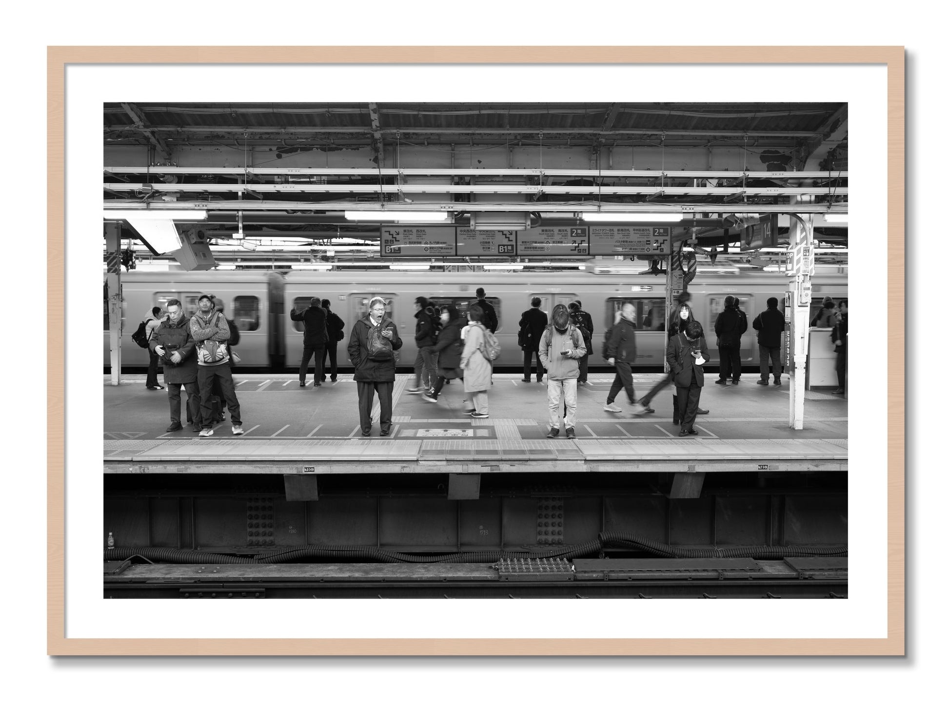 Framed photograph of Tokyo Subway by Dylan Ozanich, Maple frame, Borders