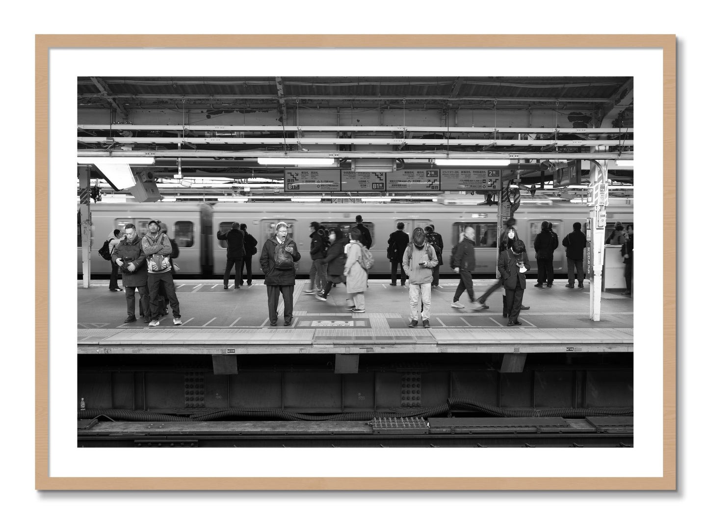 Framed photograph of Tokyo Subway by Dylan Ozanich, Oak frame, Borders
