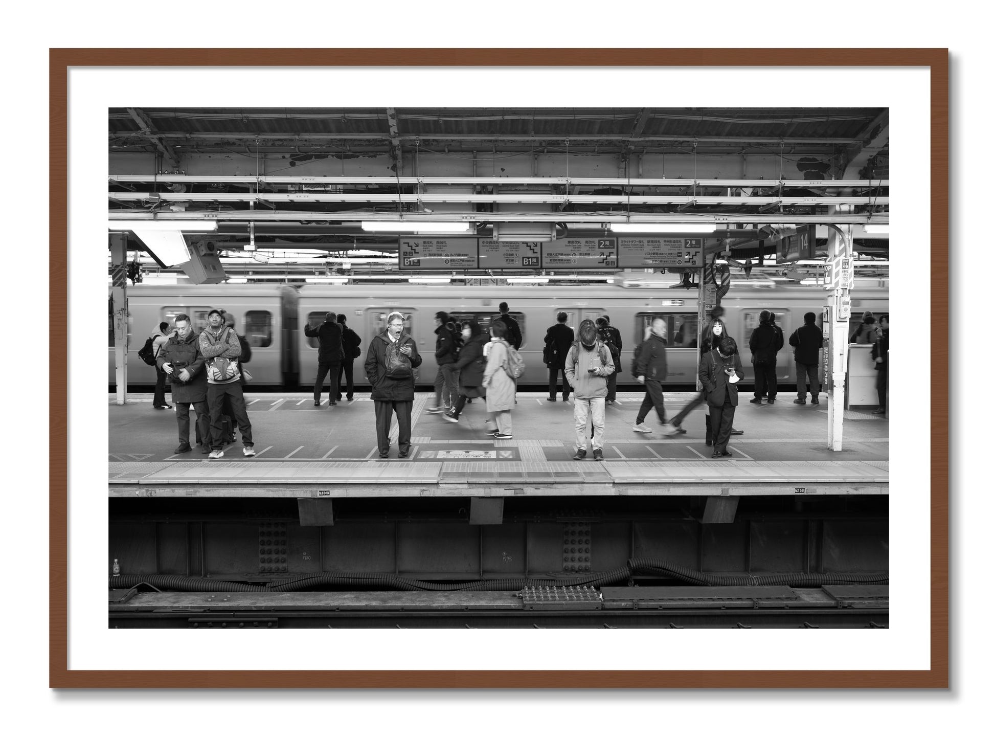 Framed photograph of Tokyo Subway by Dylan Ozanich, Walnut frame, Borders