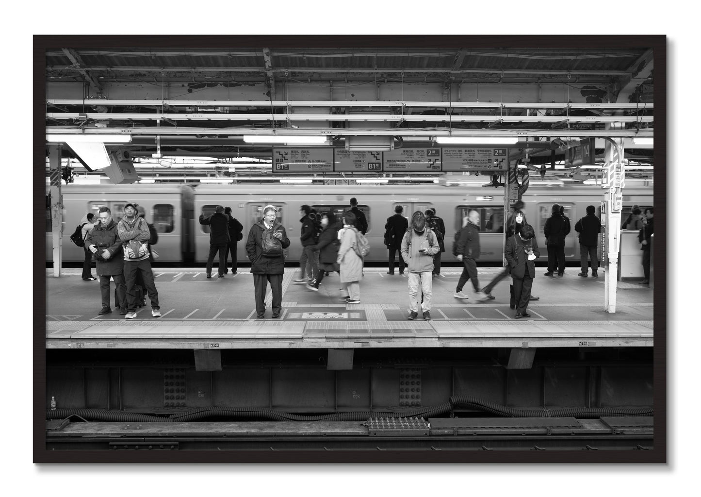 Framed photograph of Tokyo Subway by Dylan Ozanich, Black Walnut frame, Full Bleed