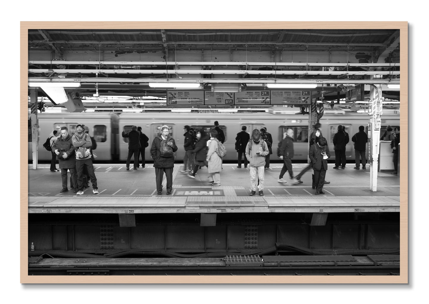 Framed photograph of Tokyo Subway by Dylan Ozanich, Maple frame, Full Bleed