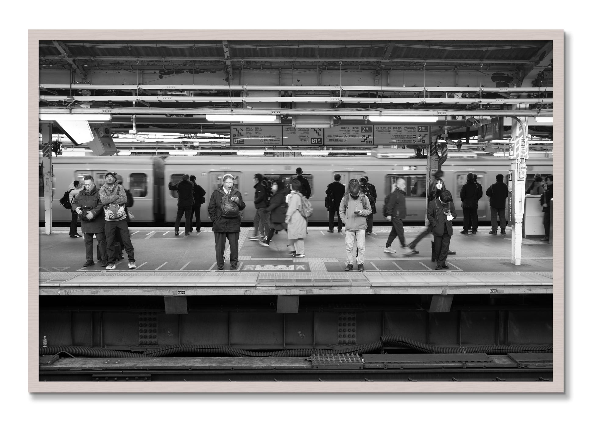 Framed photograph of Tokyo Subway by Dylan Ozanich, White Maple frame, Full Bleed