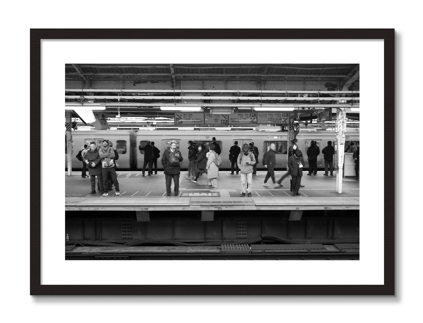 Framed photograph of Tokyo Subway by Dylan Ozanich, Black frame, Borders