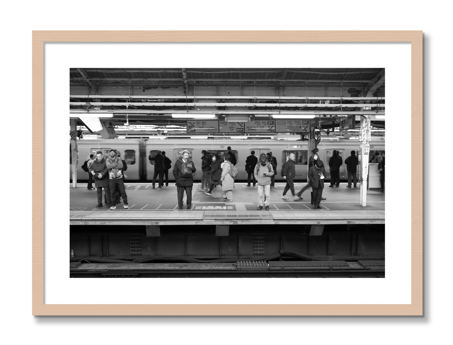 Framed photograph of Tokyo Subway by Dylan Ozanich, Maple frame, Borders