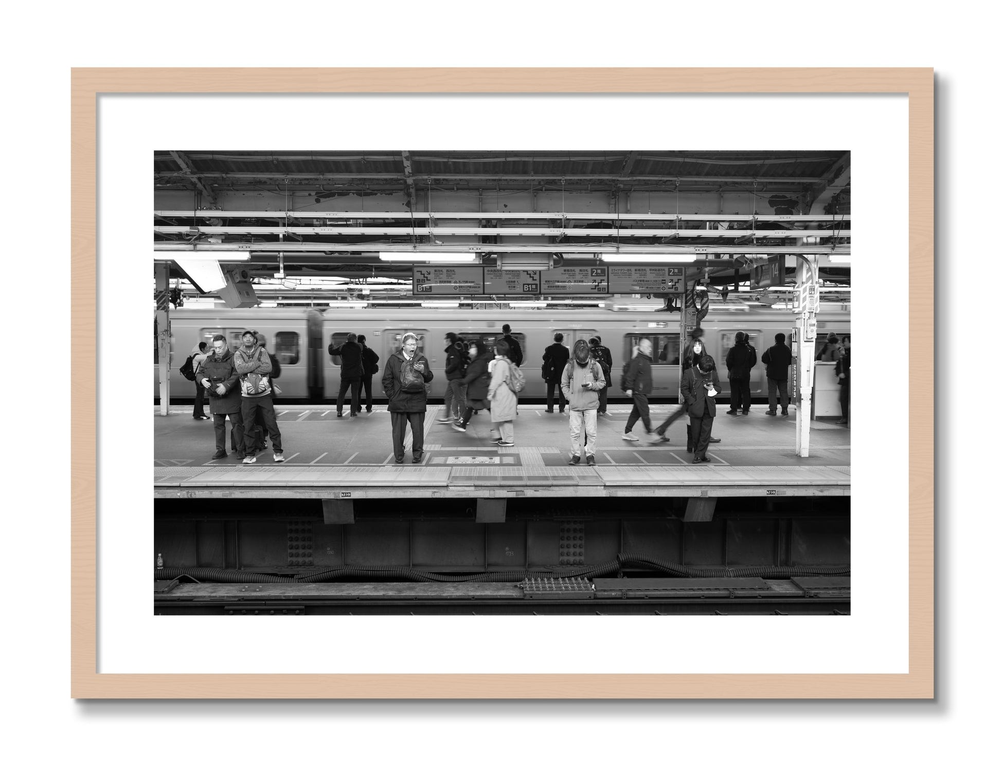 Framed photograph of Tokyo Subway by Dylan Ozanich, Maple frame, Borders
