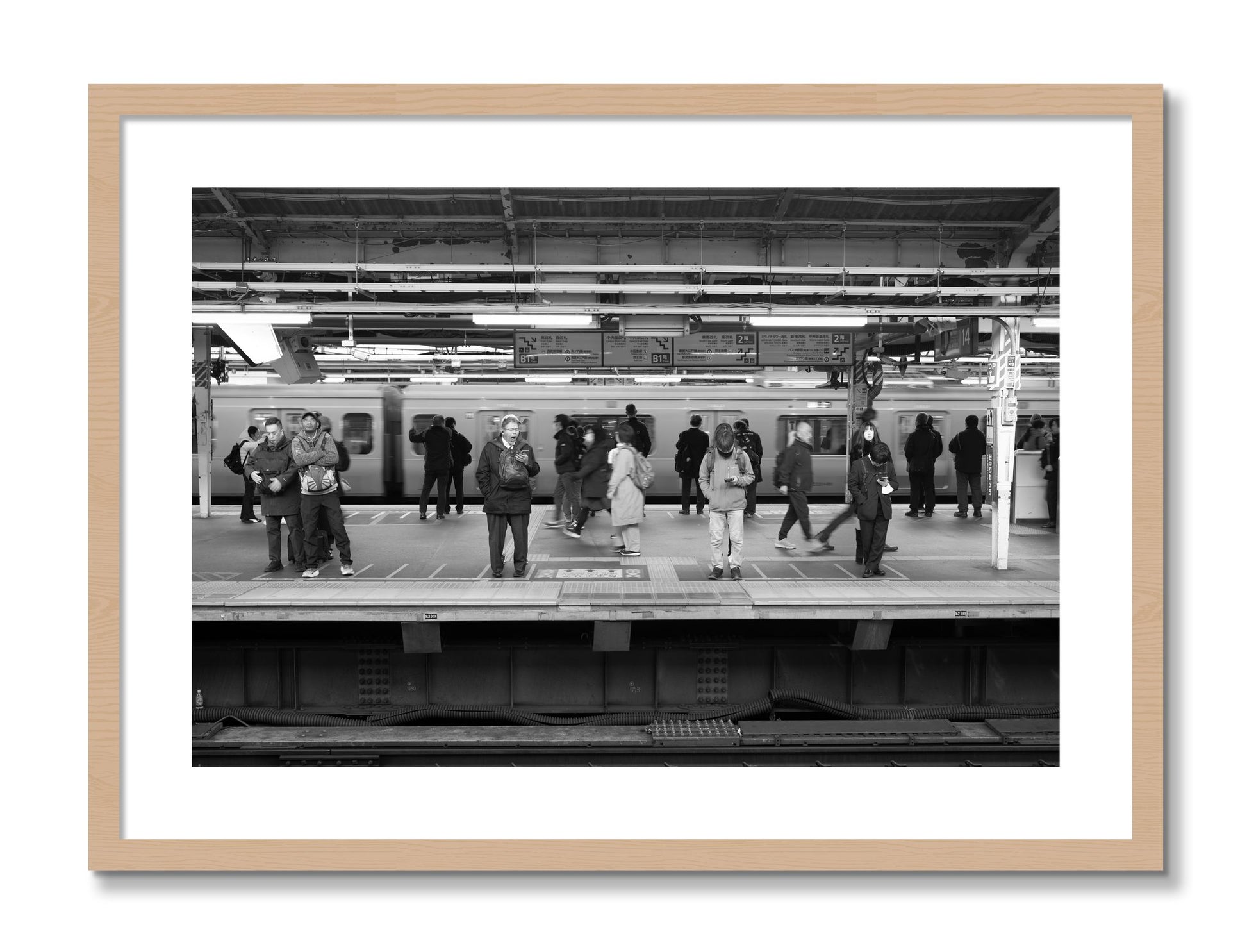 Framed photograph of Tokyo Subway by Dylan Ozanich, Oak frame, Borders