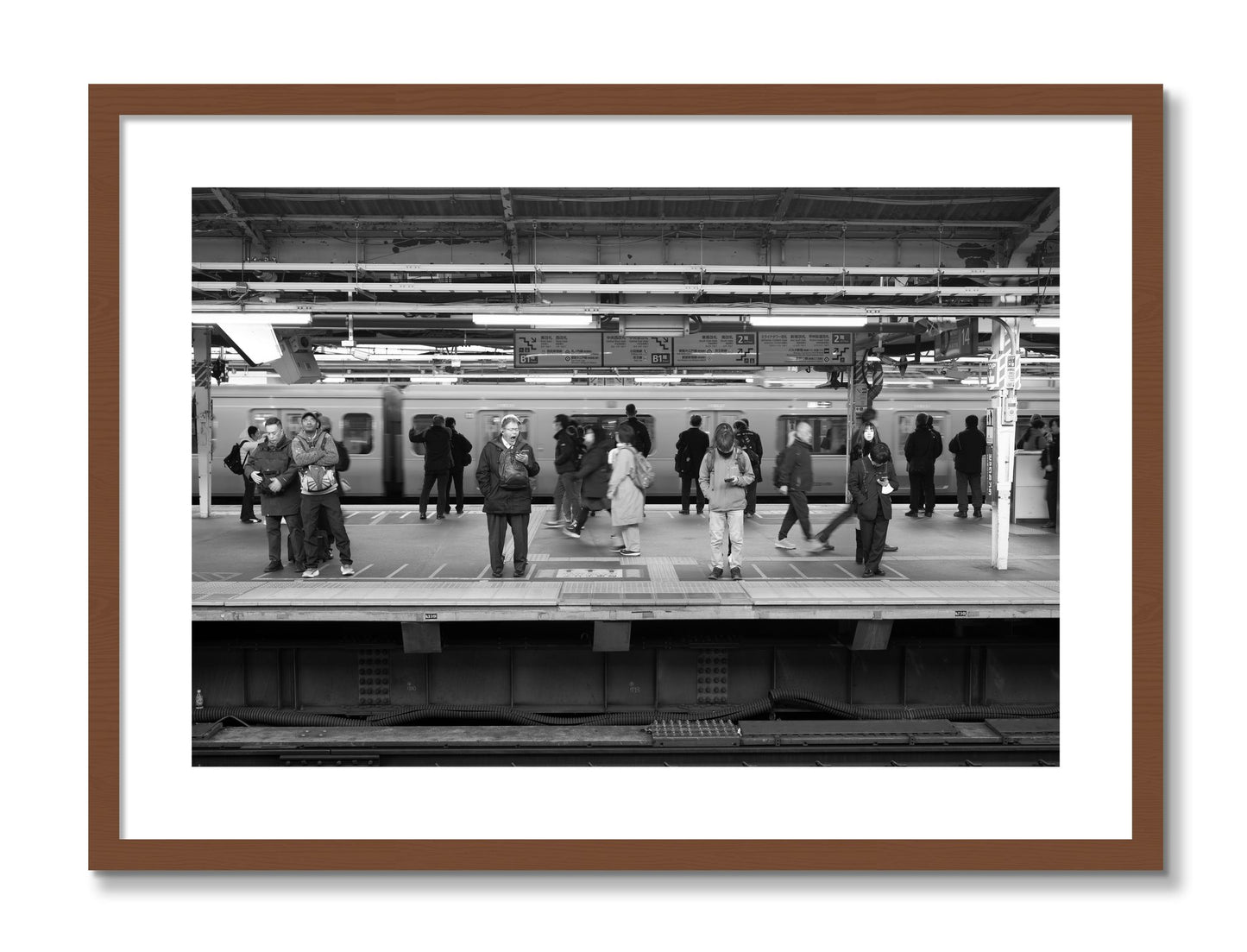 Framed photograph of Tokyo Subway by Dylan Ozanich, Walnut frame, Borders