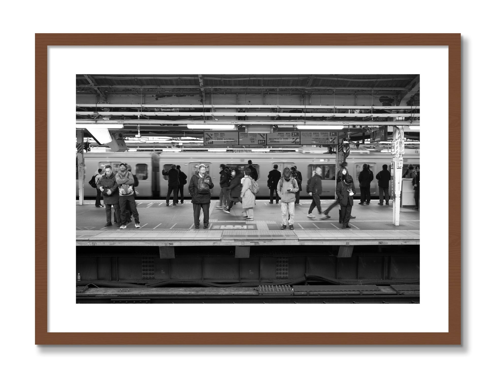 Framed photograph of Tokyo Subway by Dylan Ozanich, Walnut frame, Borders