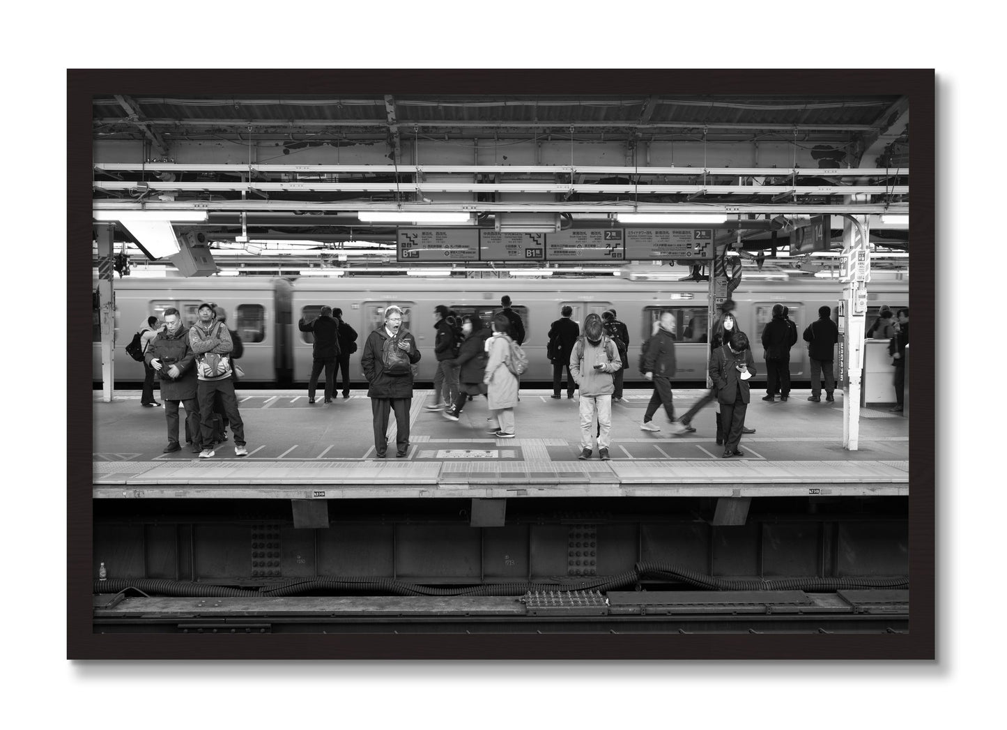 Framed photograph of Tokyo Subway by Dylan Ozanich, Black Walnut frame, Full Bleed