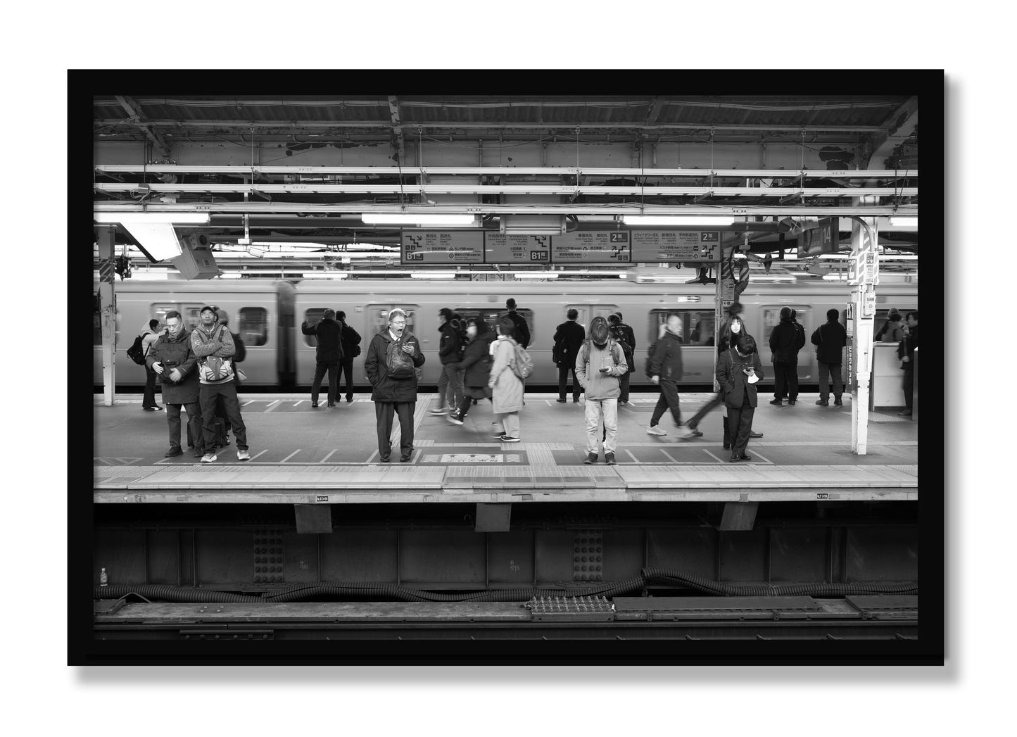Framed photograph of Tokyo Subway by Dylan Ozanich, Black frame, Full Bleed