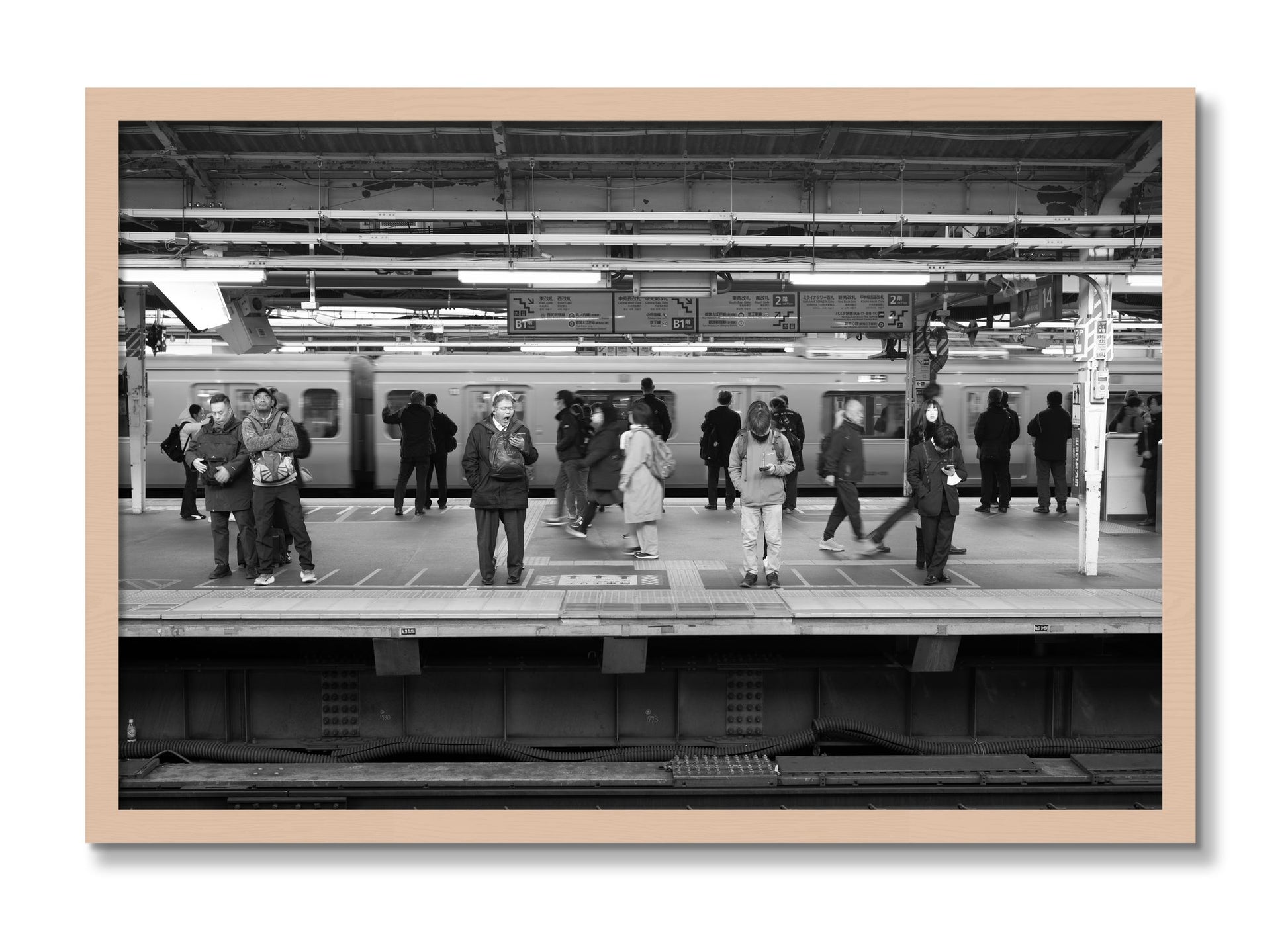 Framed photograph of Tokyo Subway by Dylan Ozanich, Maple frame, Full Bleed