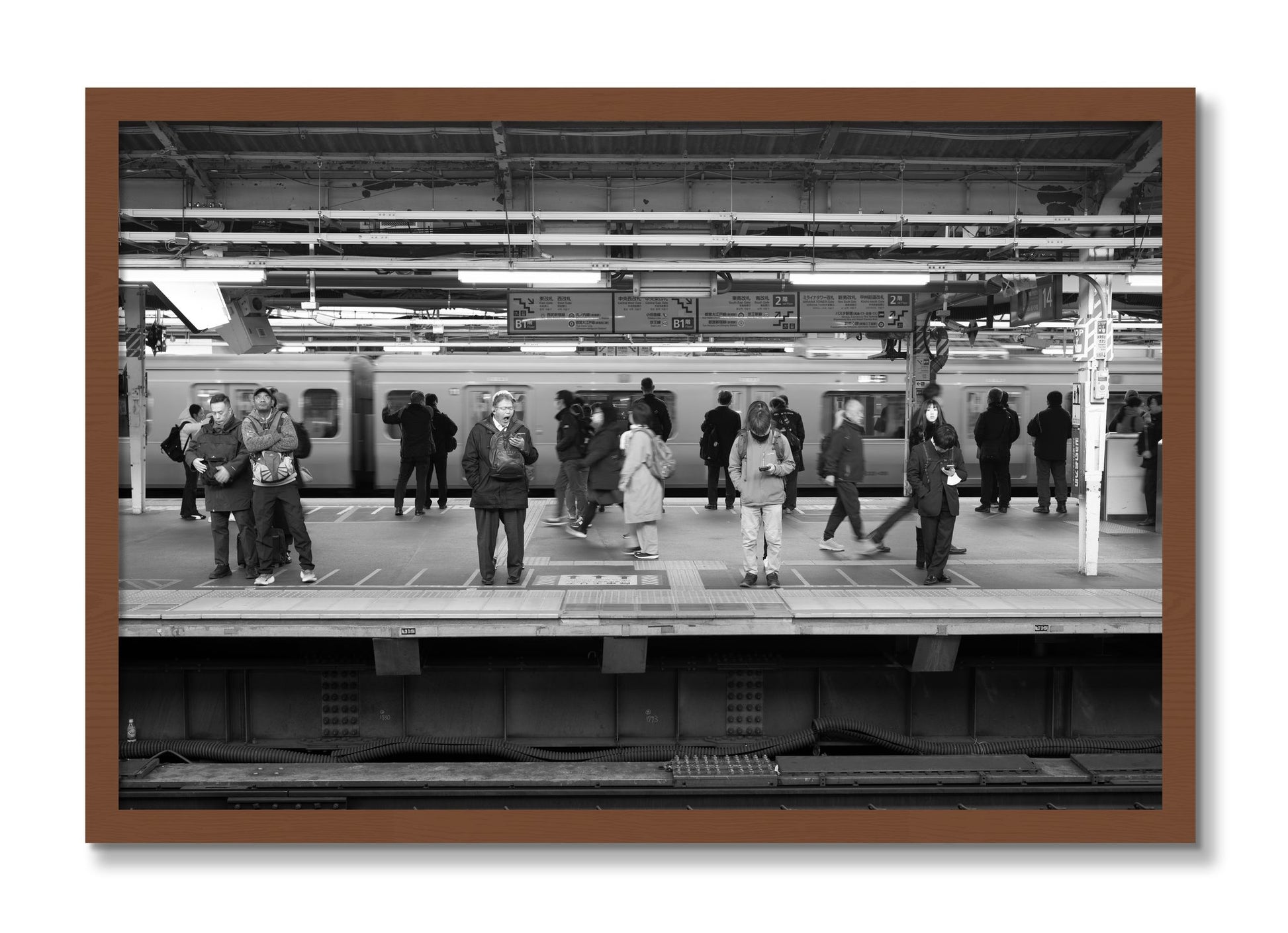 Framed photograph of Tokyo Subway by Dylan Ozanich, Walnut frame, Full Bleed