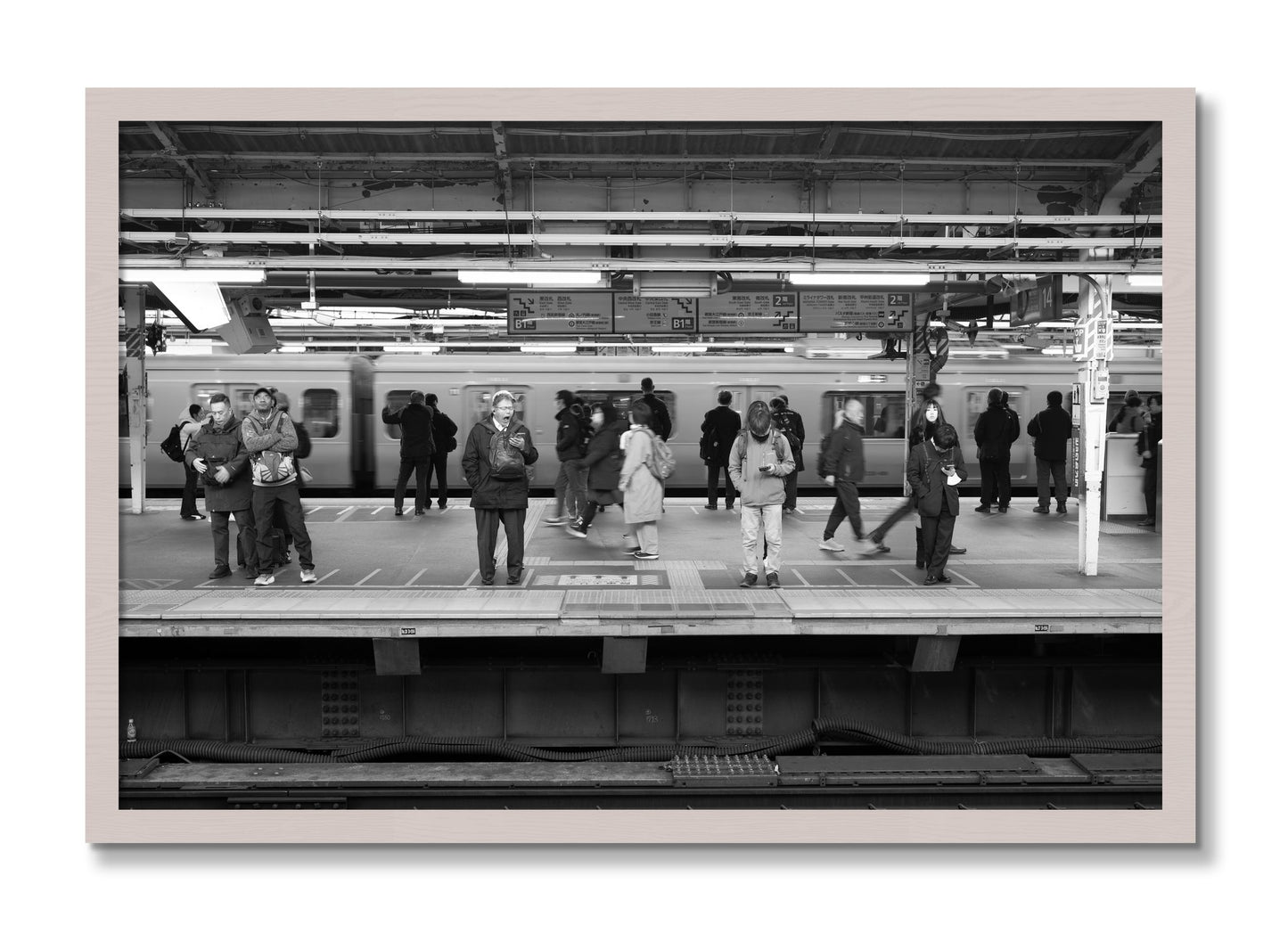 Framed photograph of Tokyo Subway by Dylan Ozanich, White Maple frame, Full Bleed