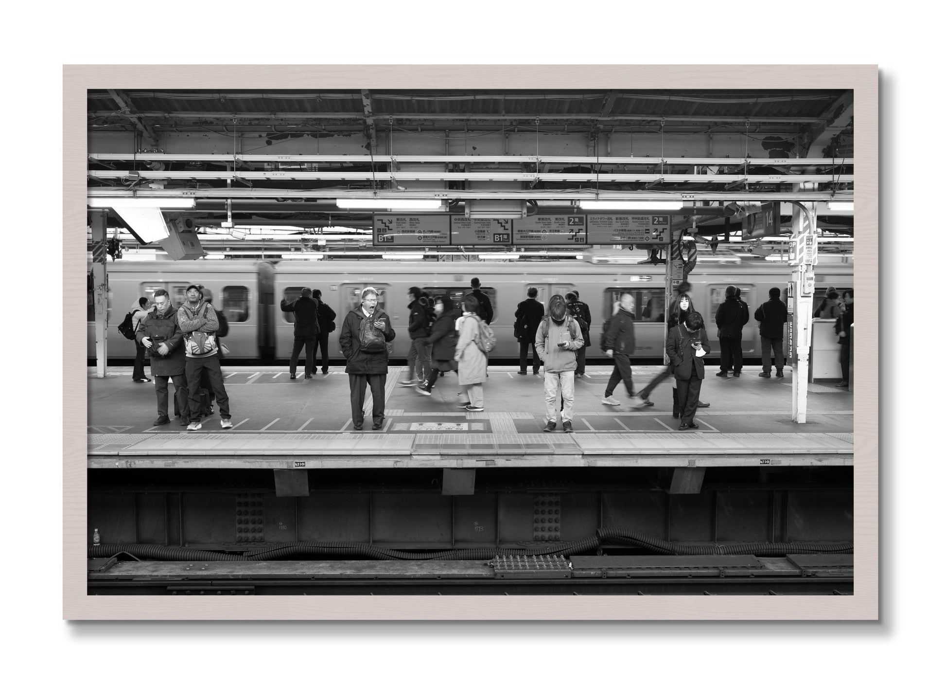 Framed photograph of Tokyo Subway by Dylan Ozanich, White Maple frame, Full Bleed